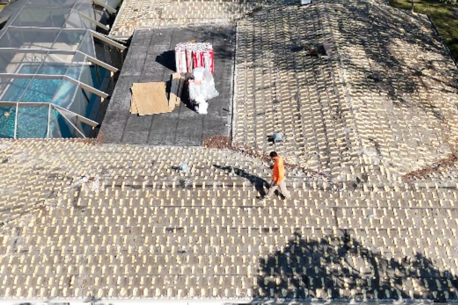 Roofing materials staged on a South Florida residential worksite — Bigfoot Roofing job preparation showing material placement before installation begins