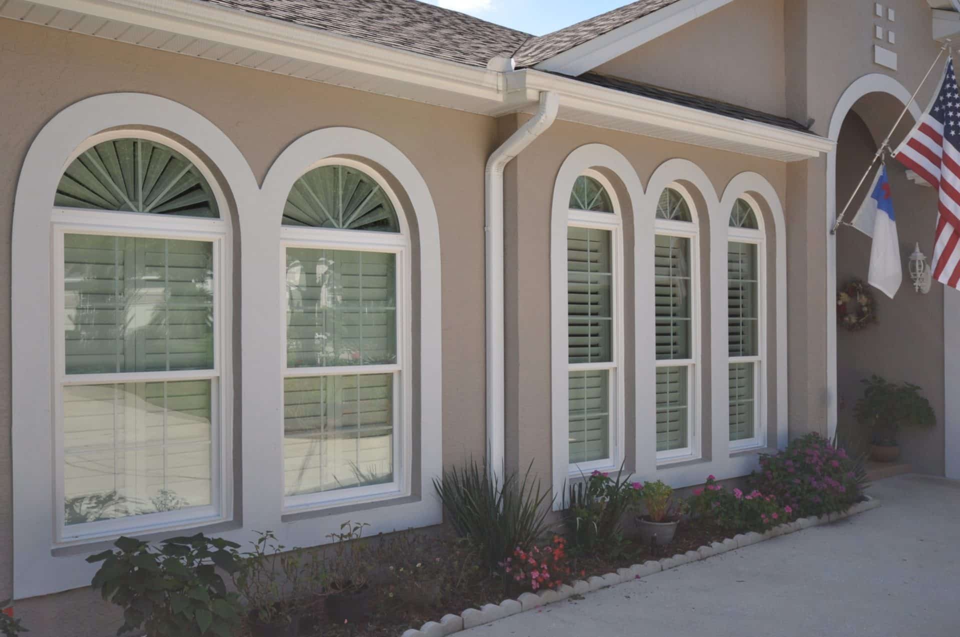 Comparison of aluminum and vinyl impact window frames showing construction differences