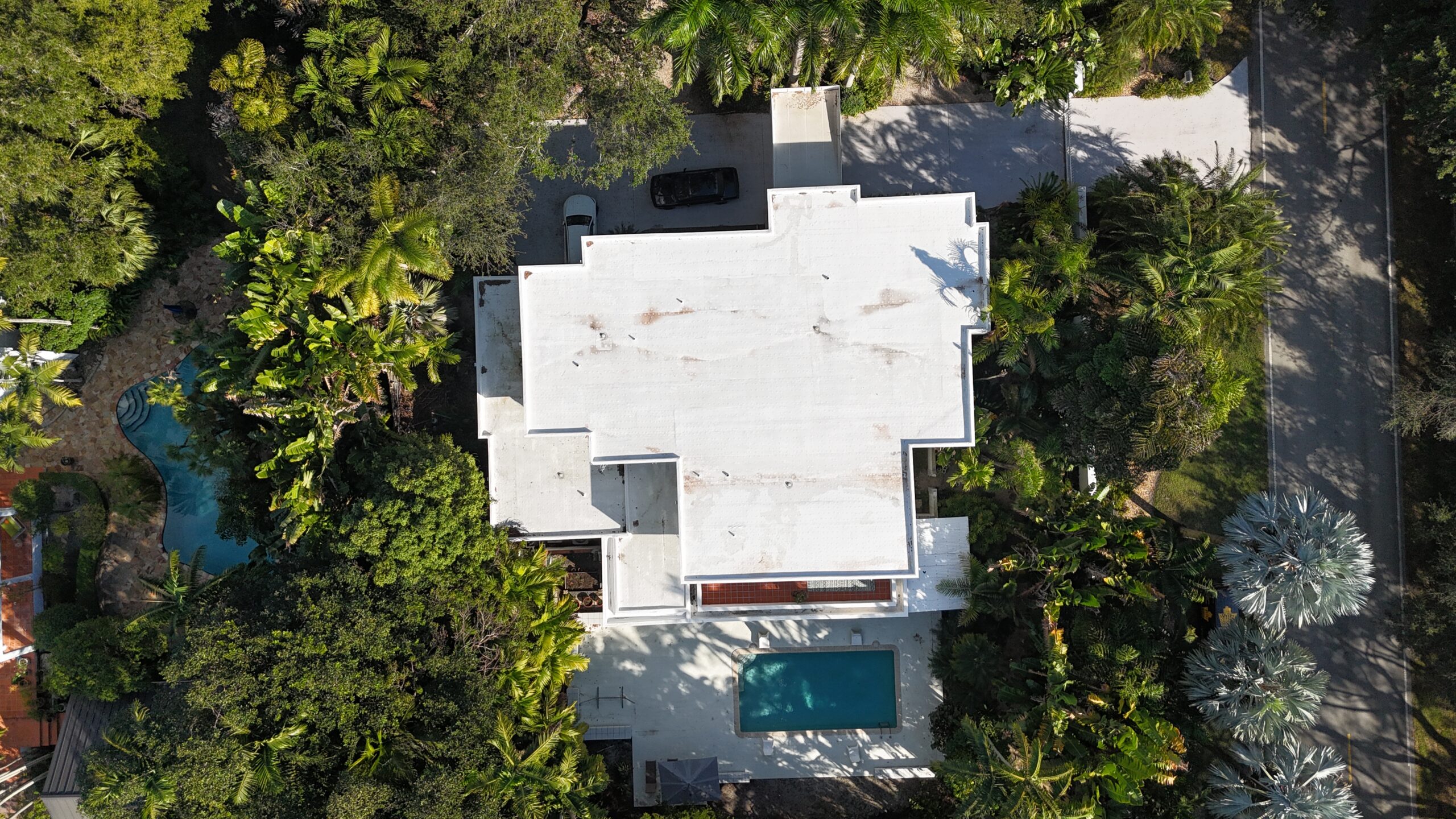 Completed roof project in Pinecrest by Bigfoot Windows & Roofing