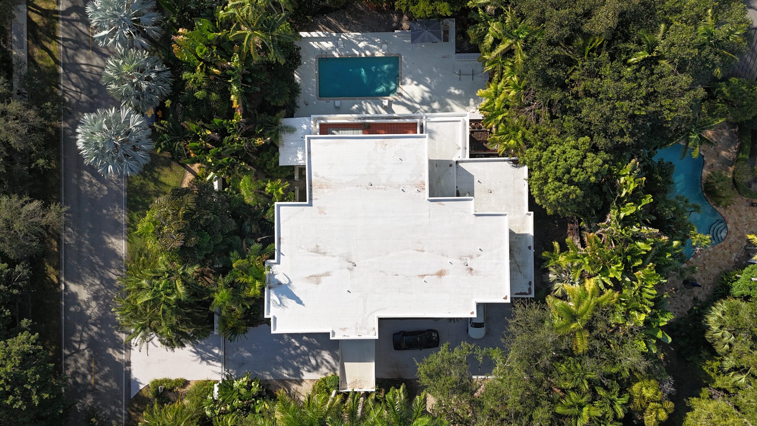 Completed roof project in Pinecrest by Bigfoot Windows & Roofing