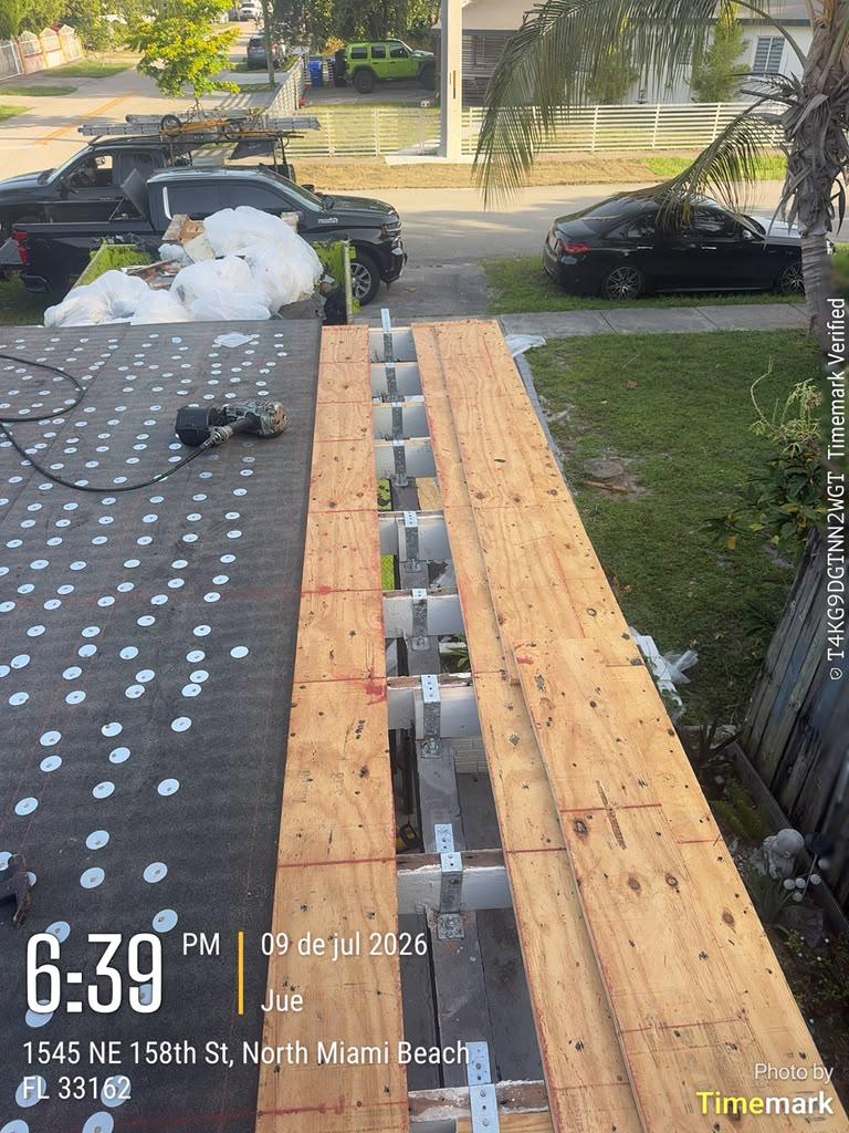 Installed hurricane strap and structural connector