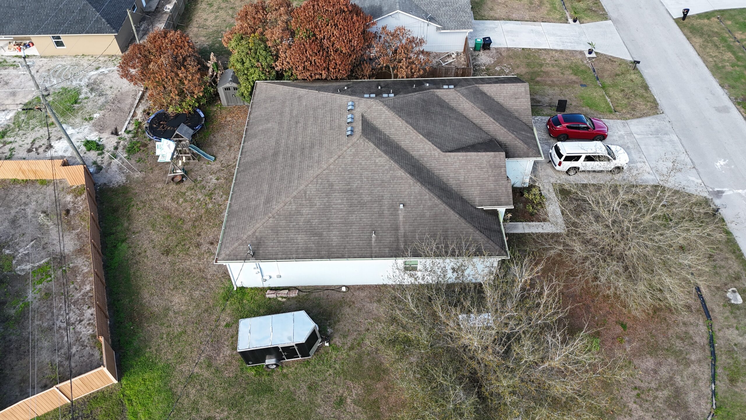 Aerial view of completed roof in Port St. Lucie by Bigfoot Windows & Roofing — unknown