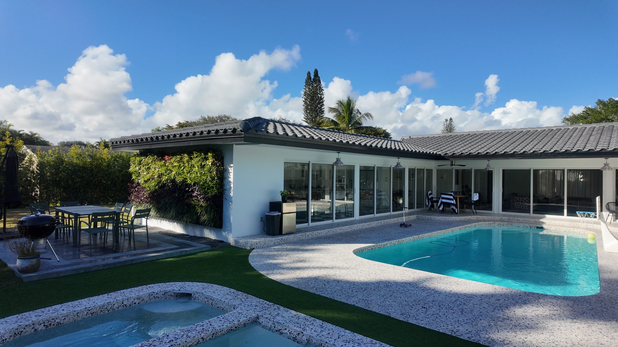 Completed home exterior in Palmetto Bay by Bigfoot Windows & Roofing