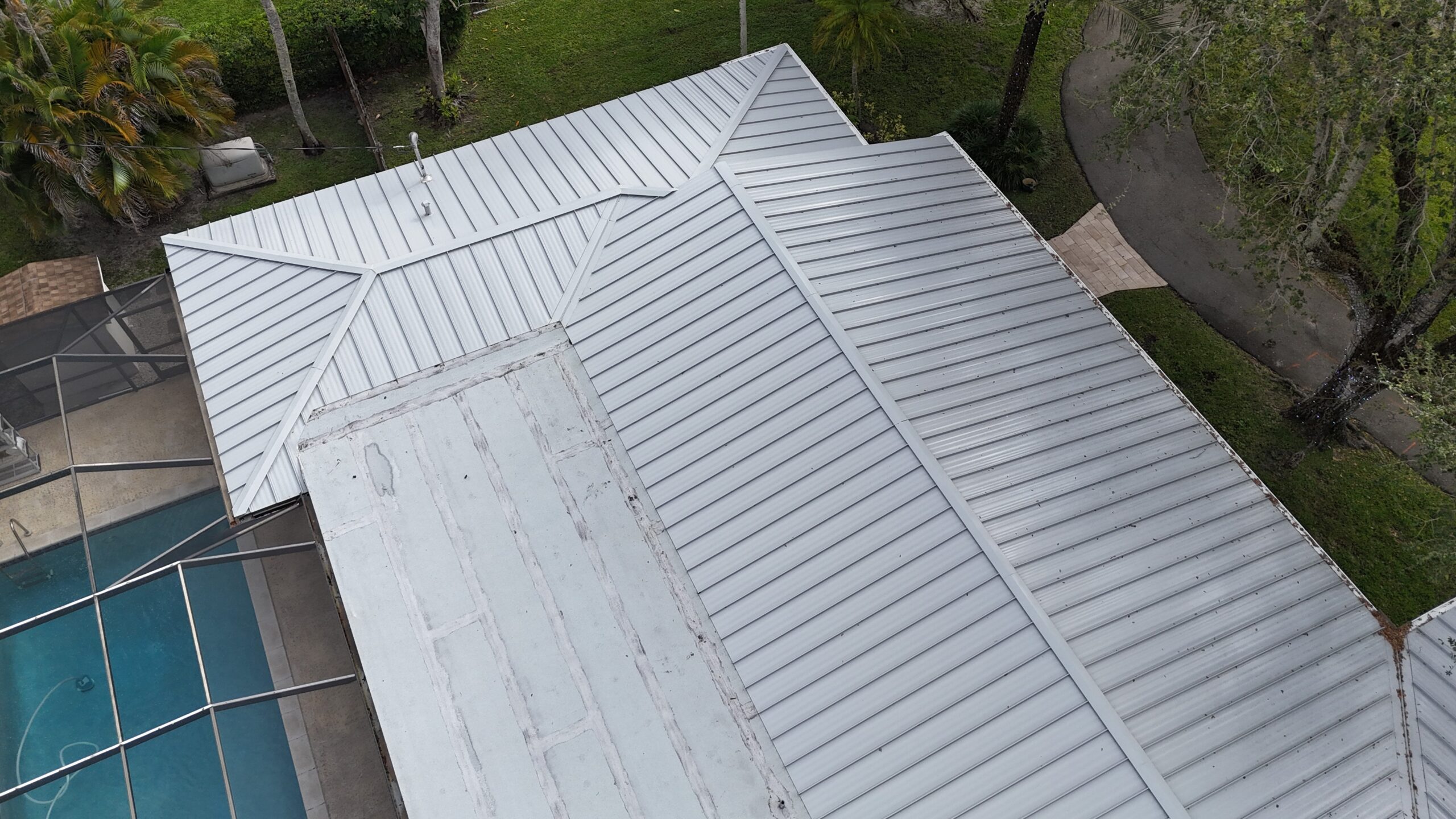Completed metal roof in Tampa by Bigfoot Windows & Roofing