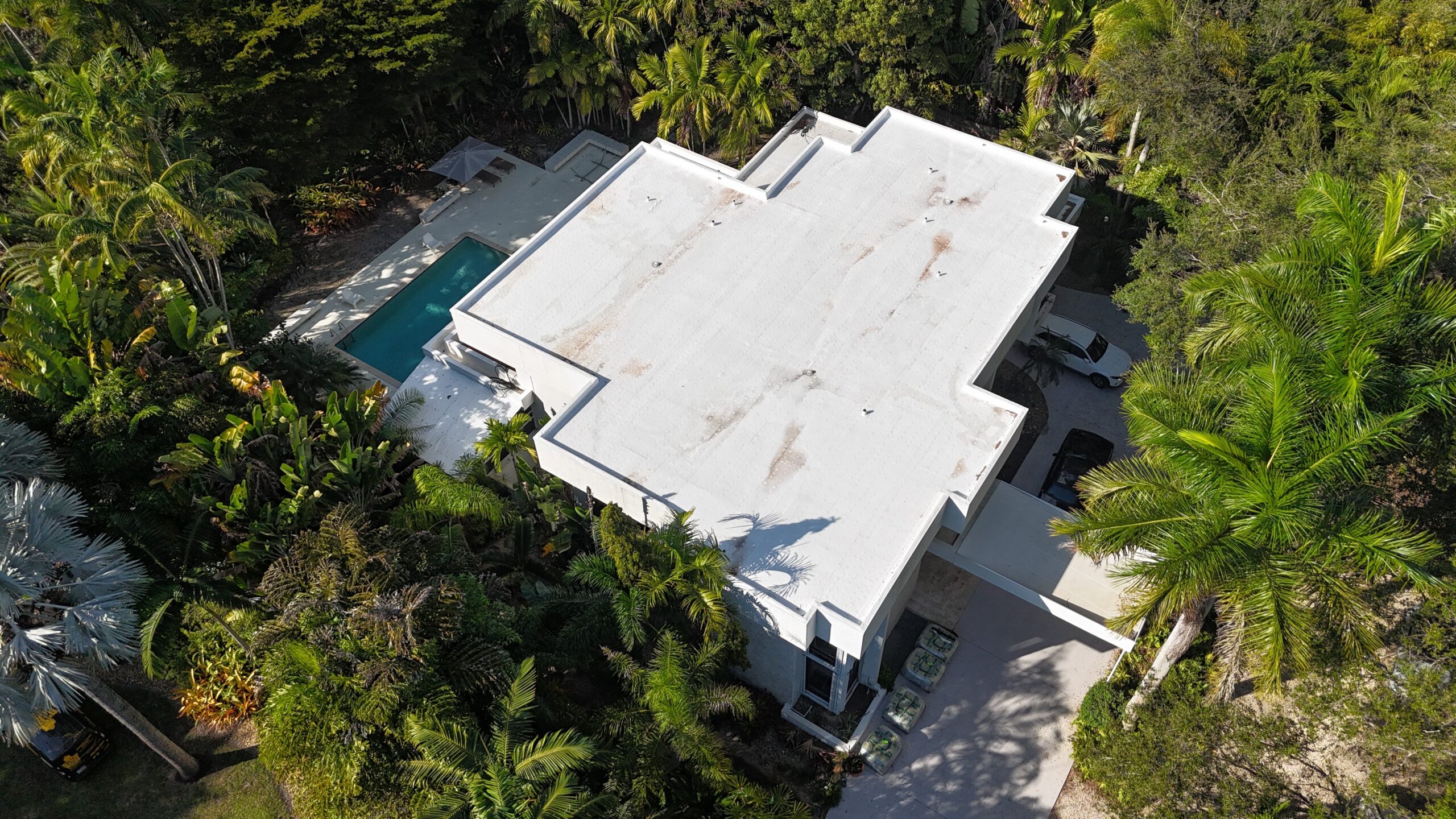 Completed roof replacement in Pinecrest, South Florida by Bigfoot Windows & Roofing