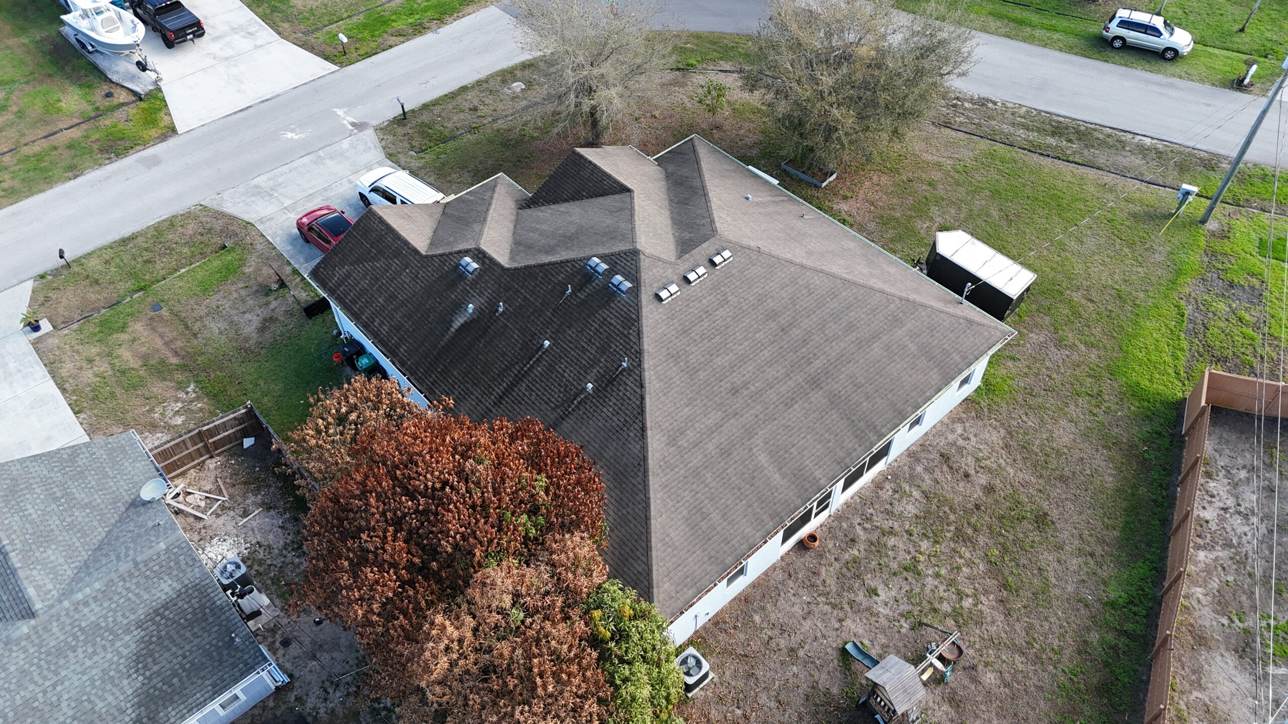 Completed shingle roof in Port St. Lucie by Bigfoot Windows & Roofing