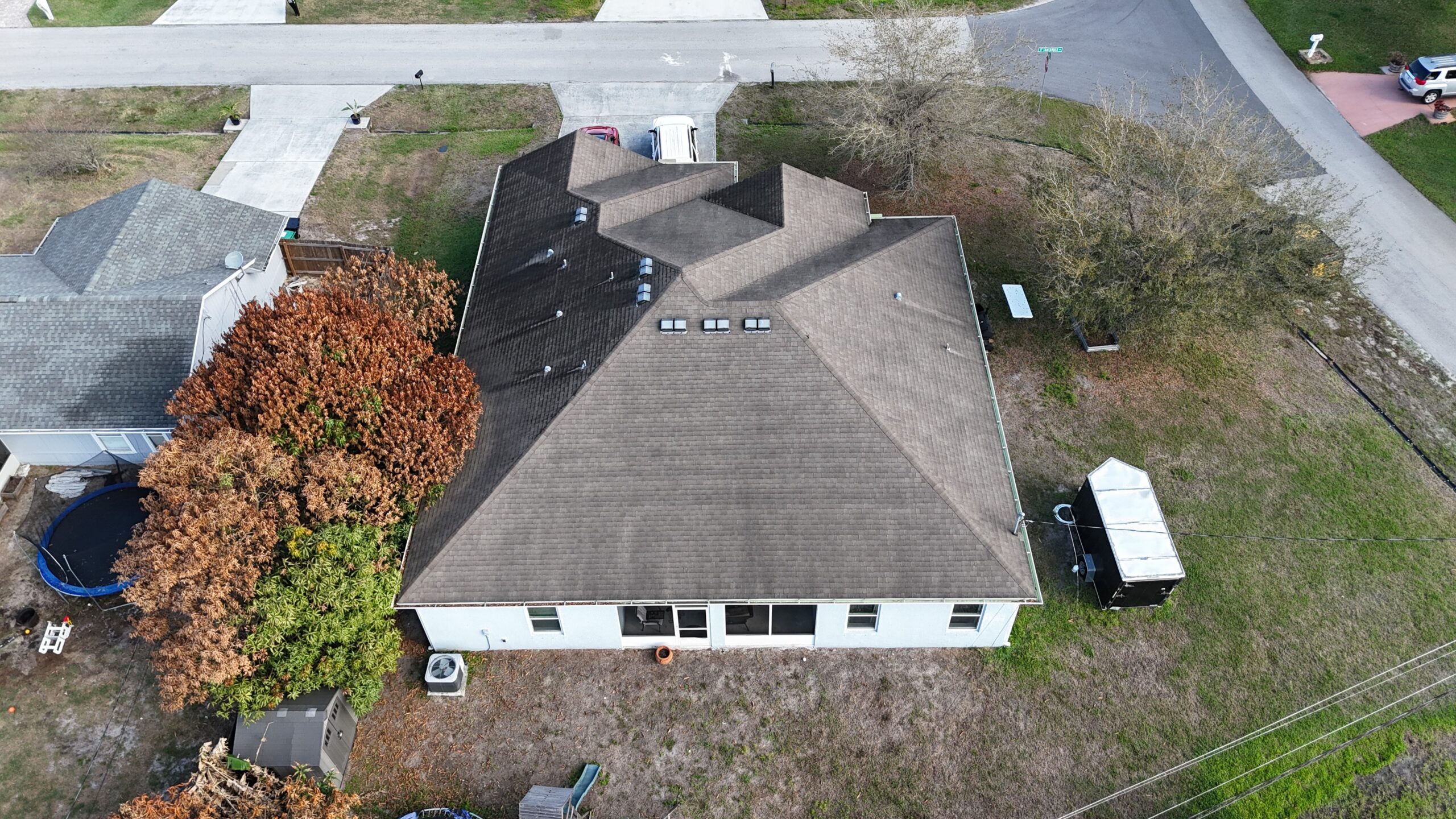 Completed shingle roof in Port St. Lucie by Bigfoot Windows & Roofing — unknown