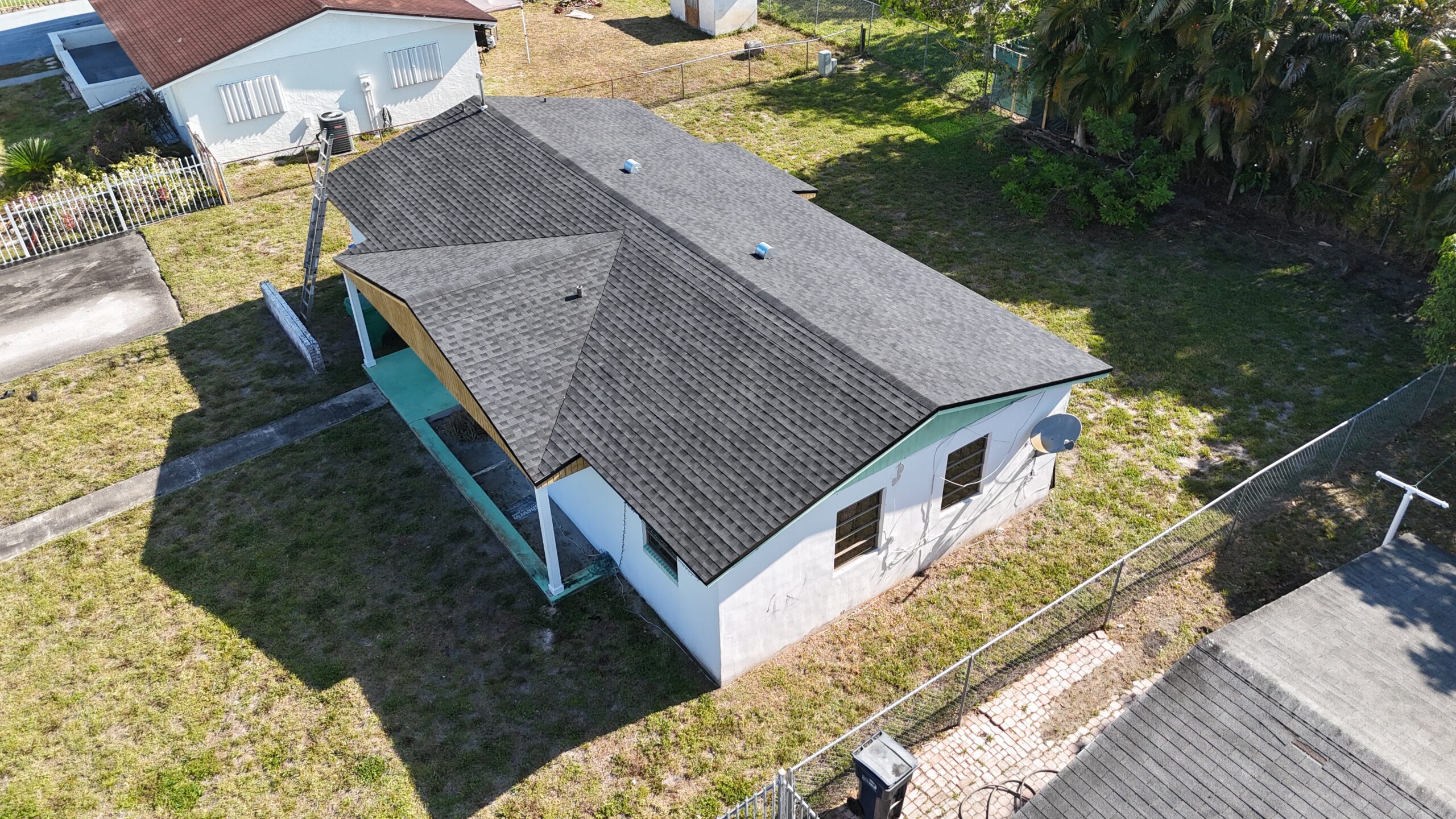 Completed shingle roof in Miami Gardens by Bigfoot Windows & Roofing