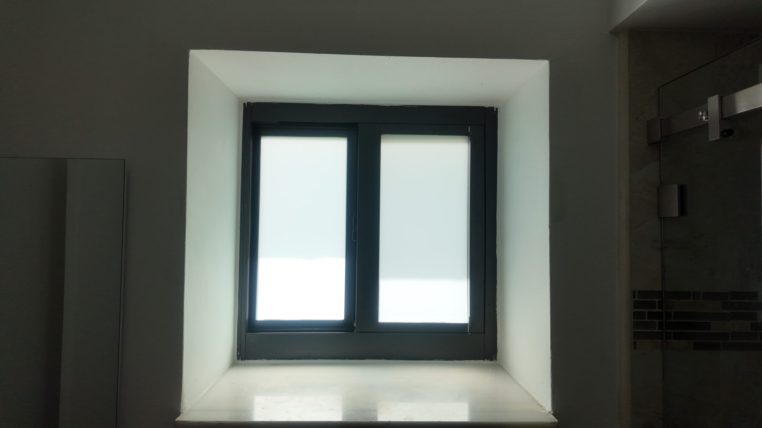 Completed impact window installation in Hollywood by Bigfoot Windows & Roofing