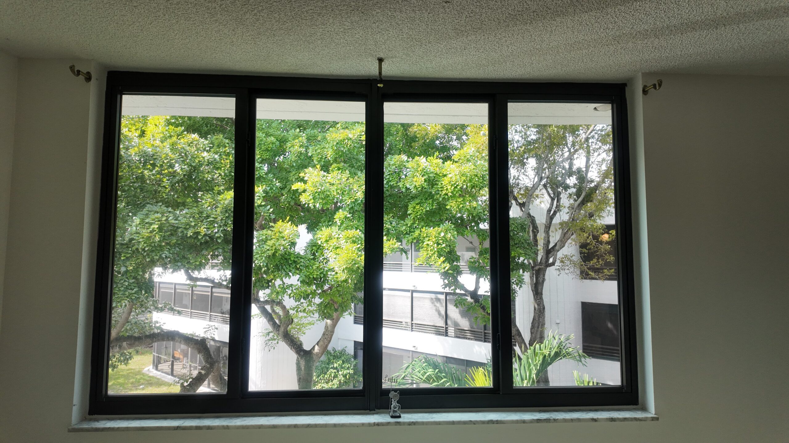 Completed impact window installation in Hollywood by Bigfoot Windows & Roofing