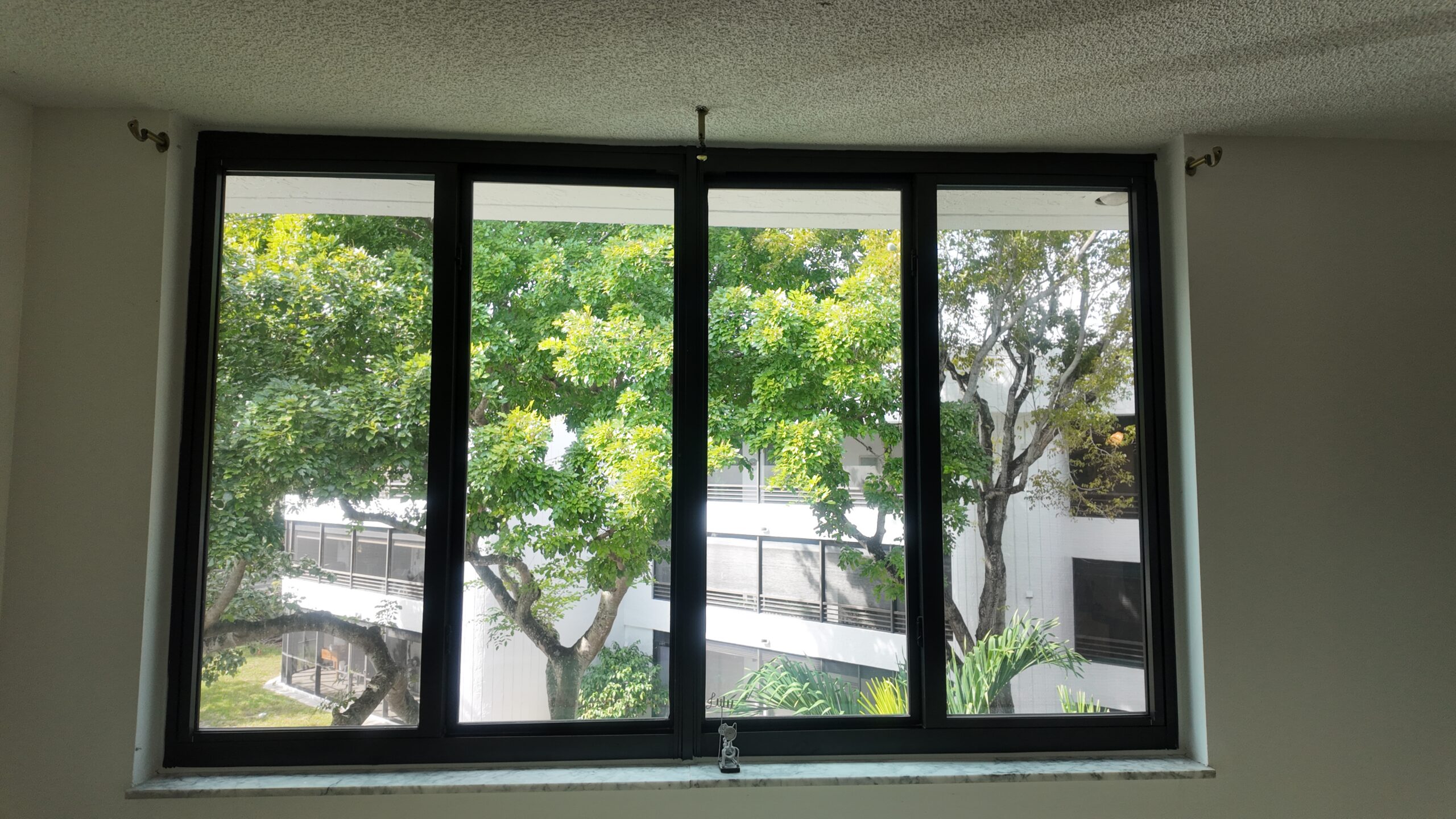 Completed impact window installation in Hollywood by Bigfoot Windows & Roofing