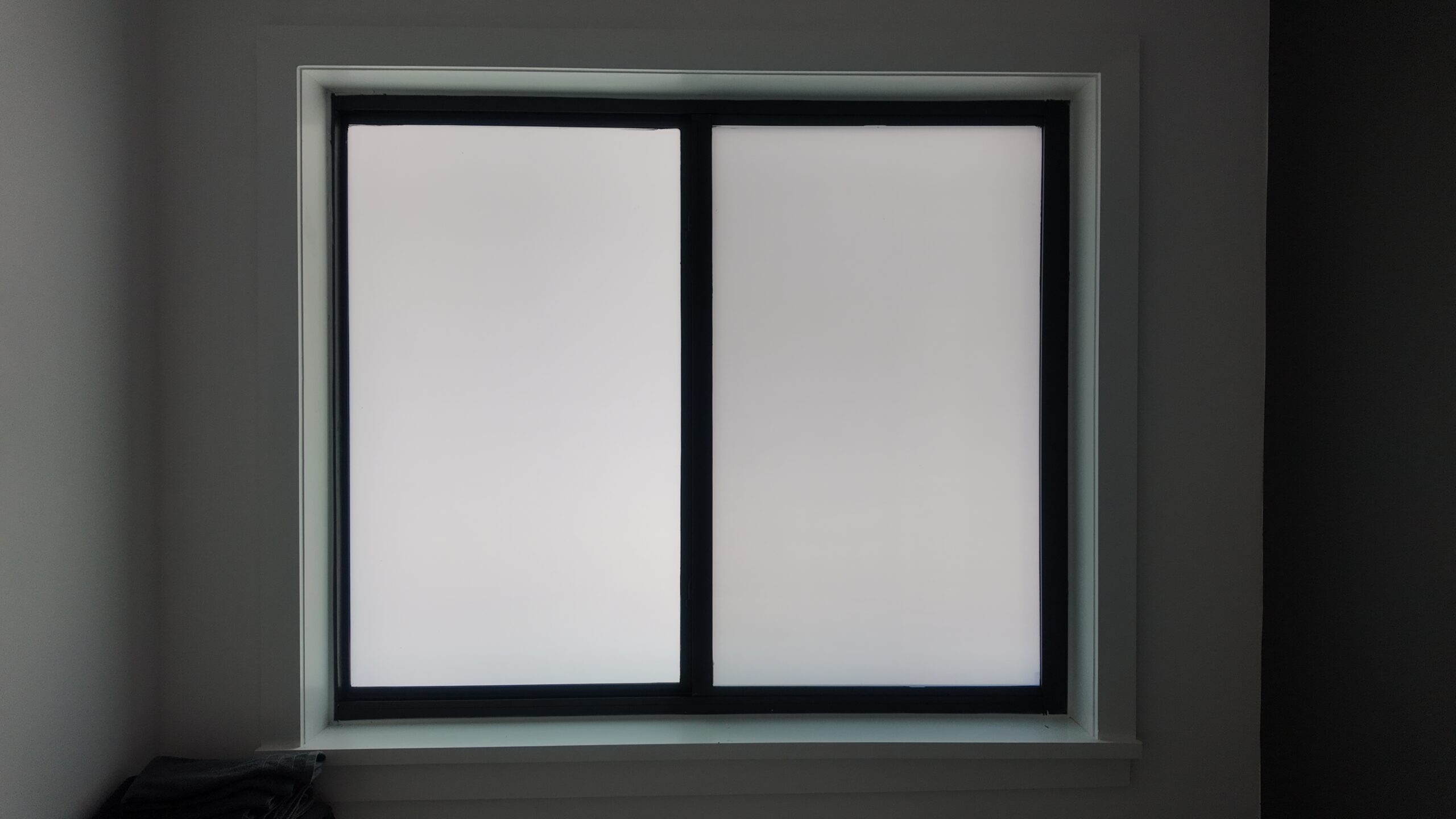 Completed impact window installation on a Miami-Dade home