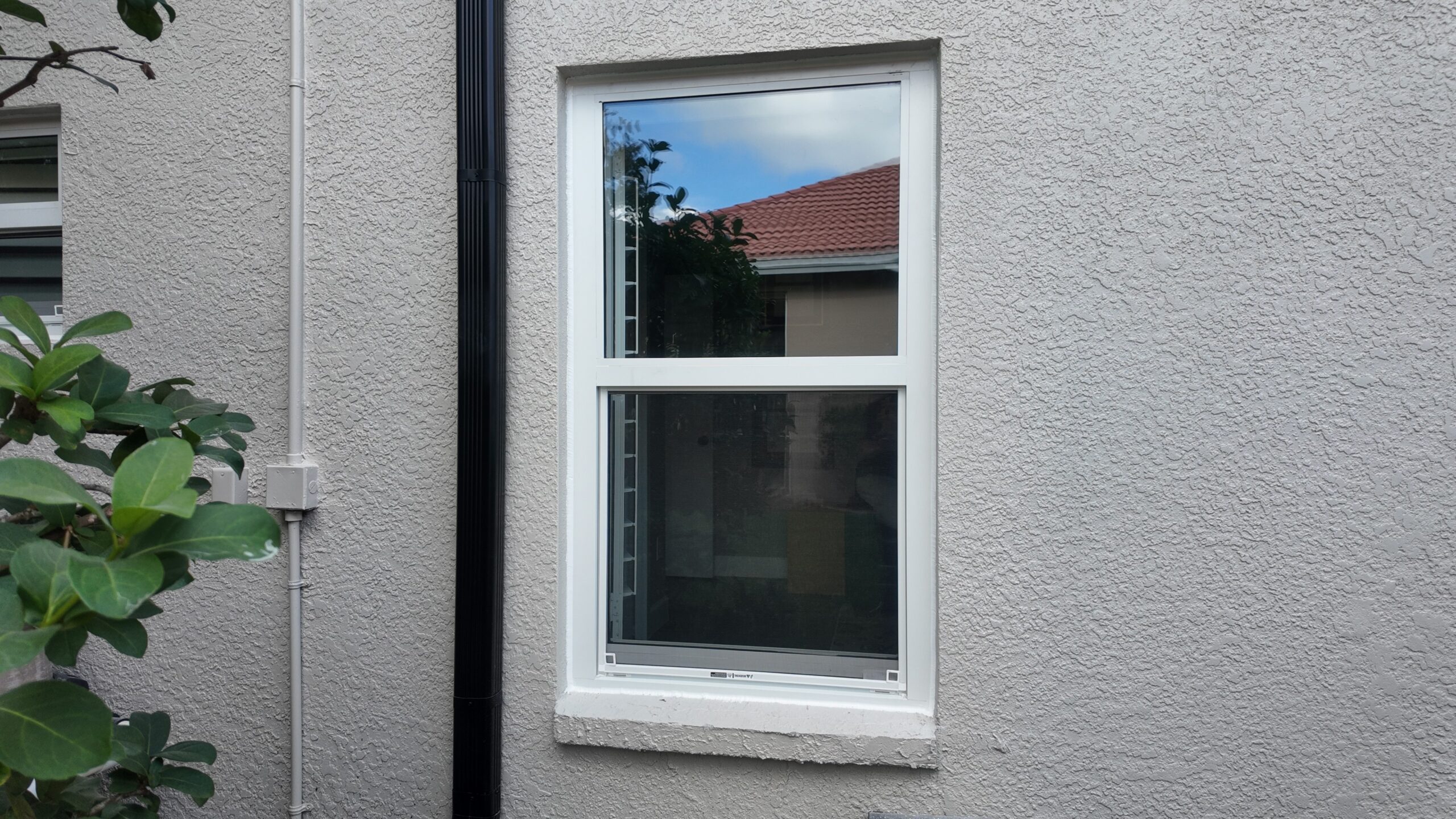 Completed impact window installation in Tampa by Bigfoot Windows & Roofing — view 2
