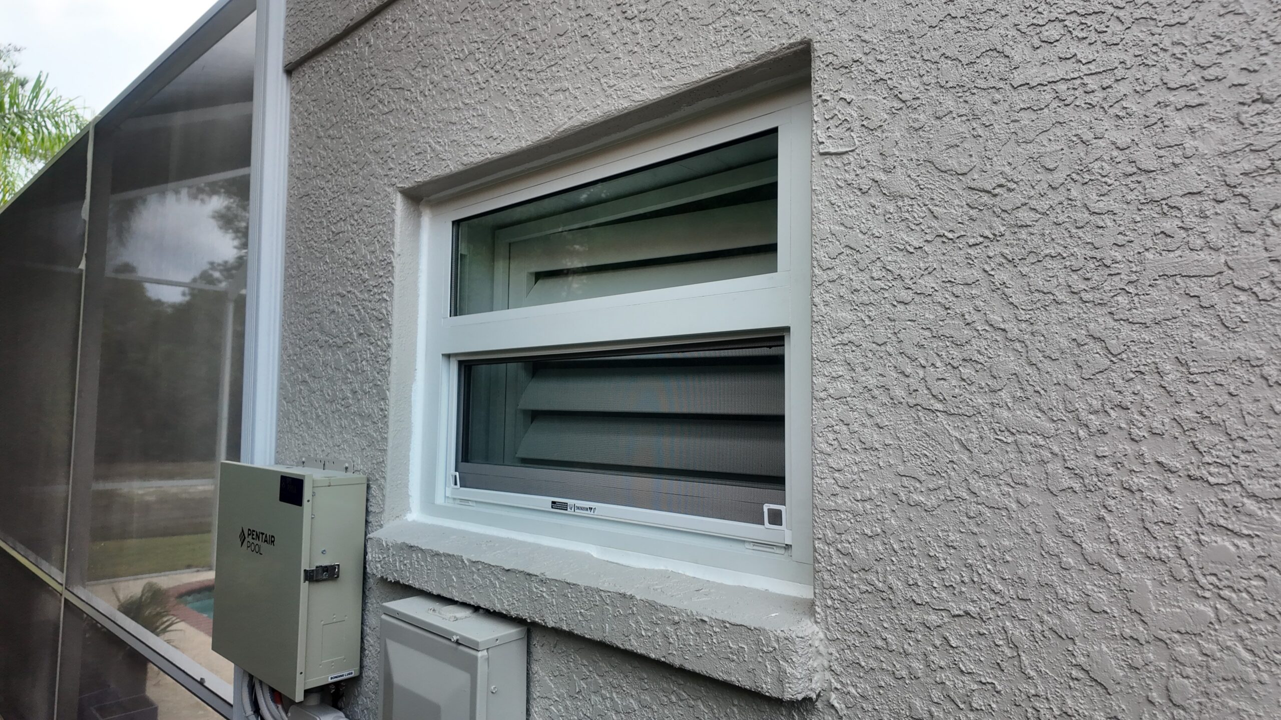 Completed impact window installation in Tampa by Bigfoot Windows & Roofing