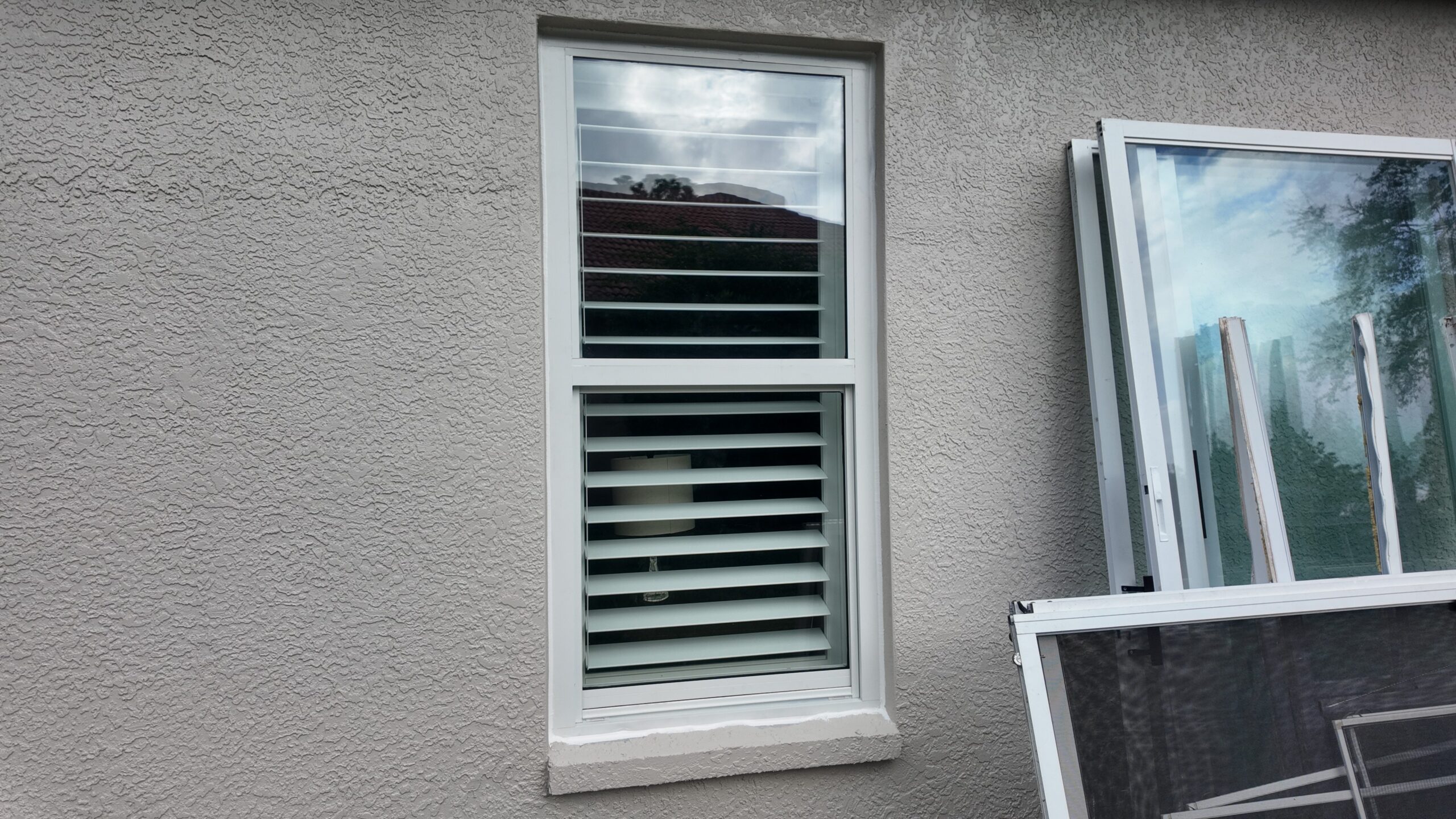 Completed impact window installation in Tampa by Bigfoot Windows & Roofing — view 2