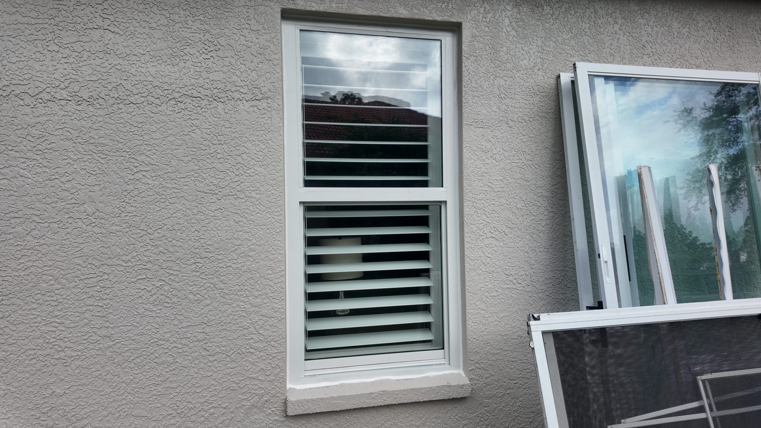 Completed impact window installation in Tampa by Bigfoot Windows & Roofing