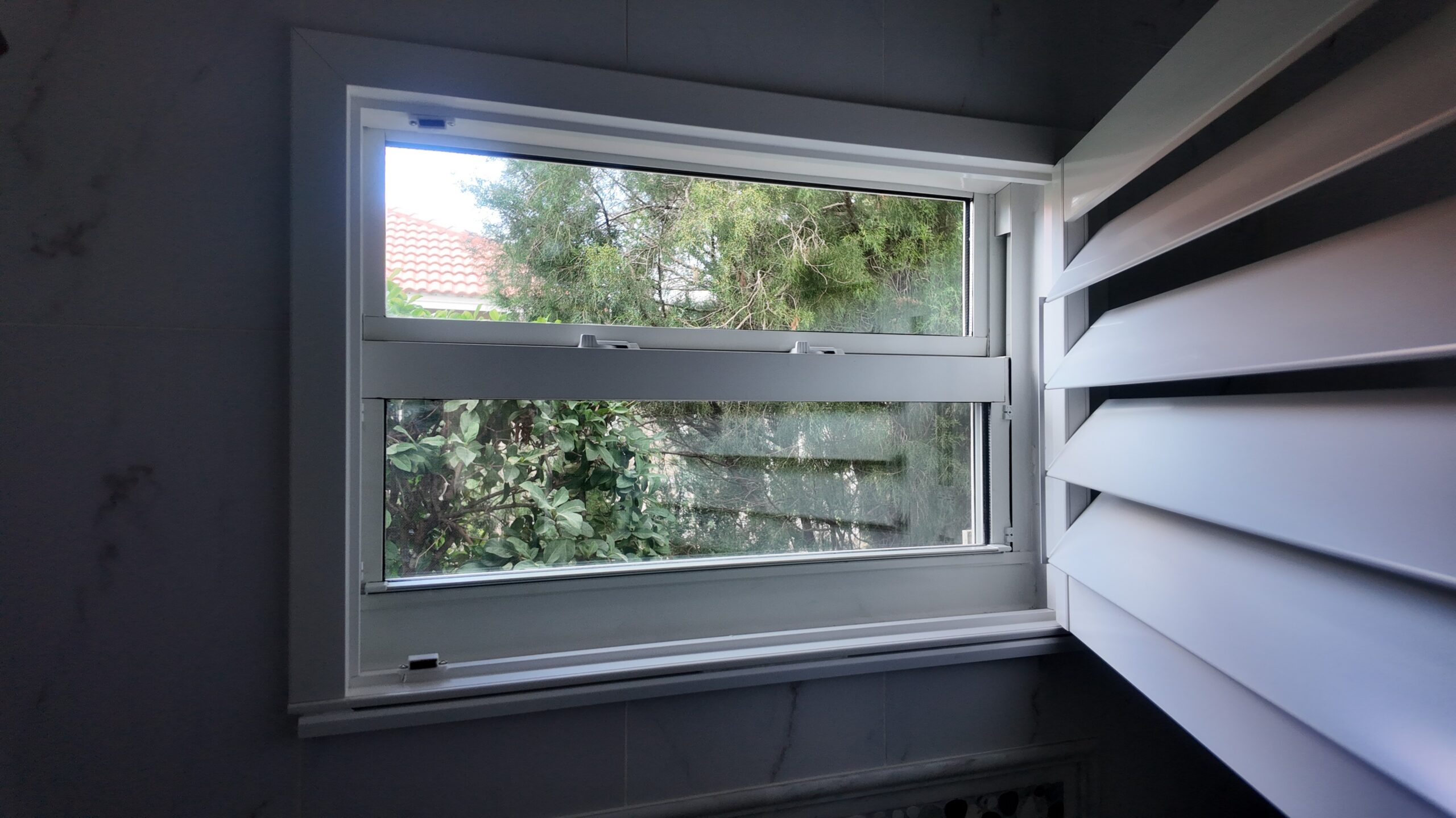 Completed impact window installation in Tampa by Bigfoot Windows & Roofing