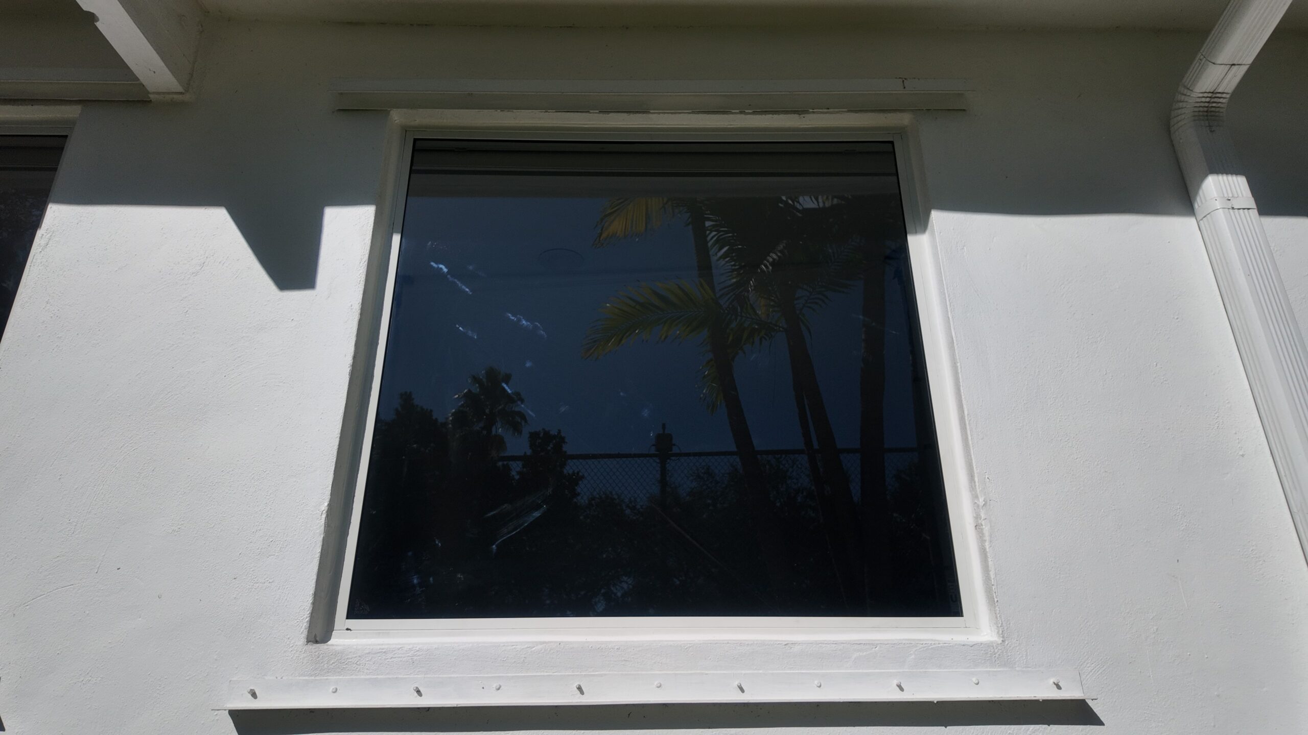 Completed impact window installation in Miami by Bigfoot Windows & Roofing — after