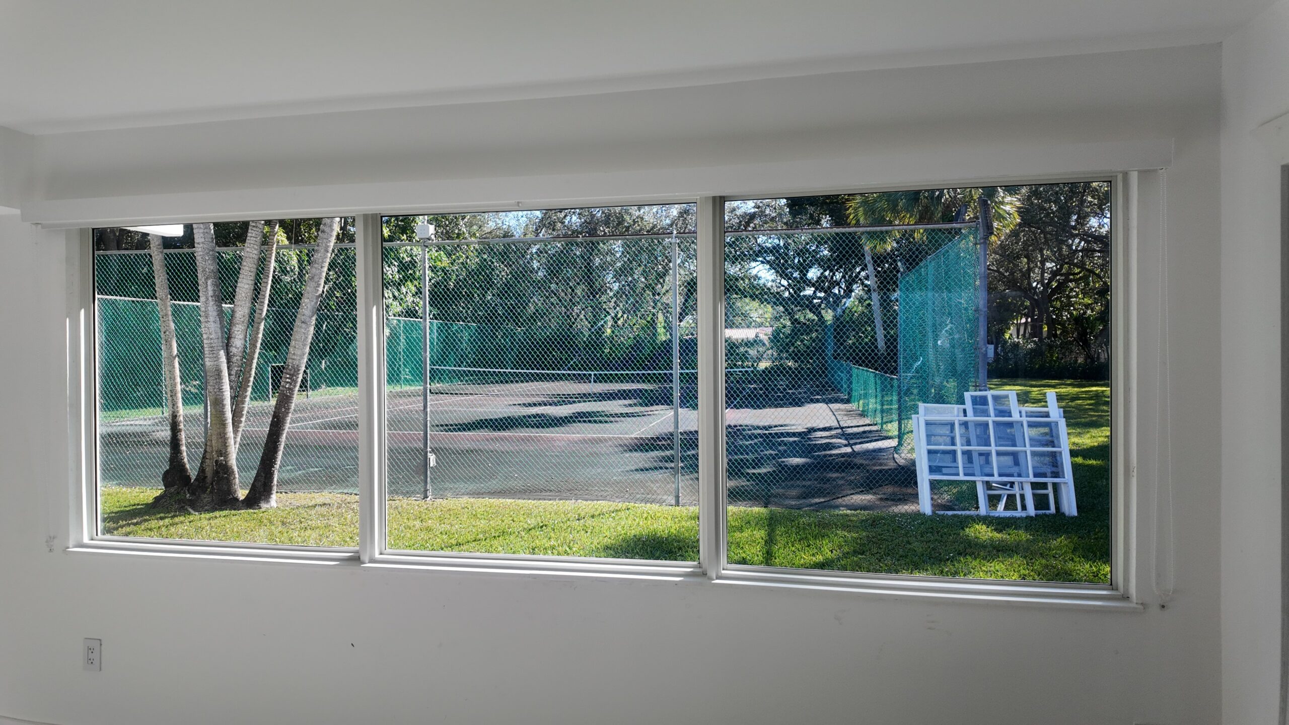 Completed impact window installation in Miami by Bigfoot Windows & Roofing — after
