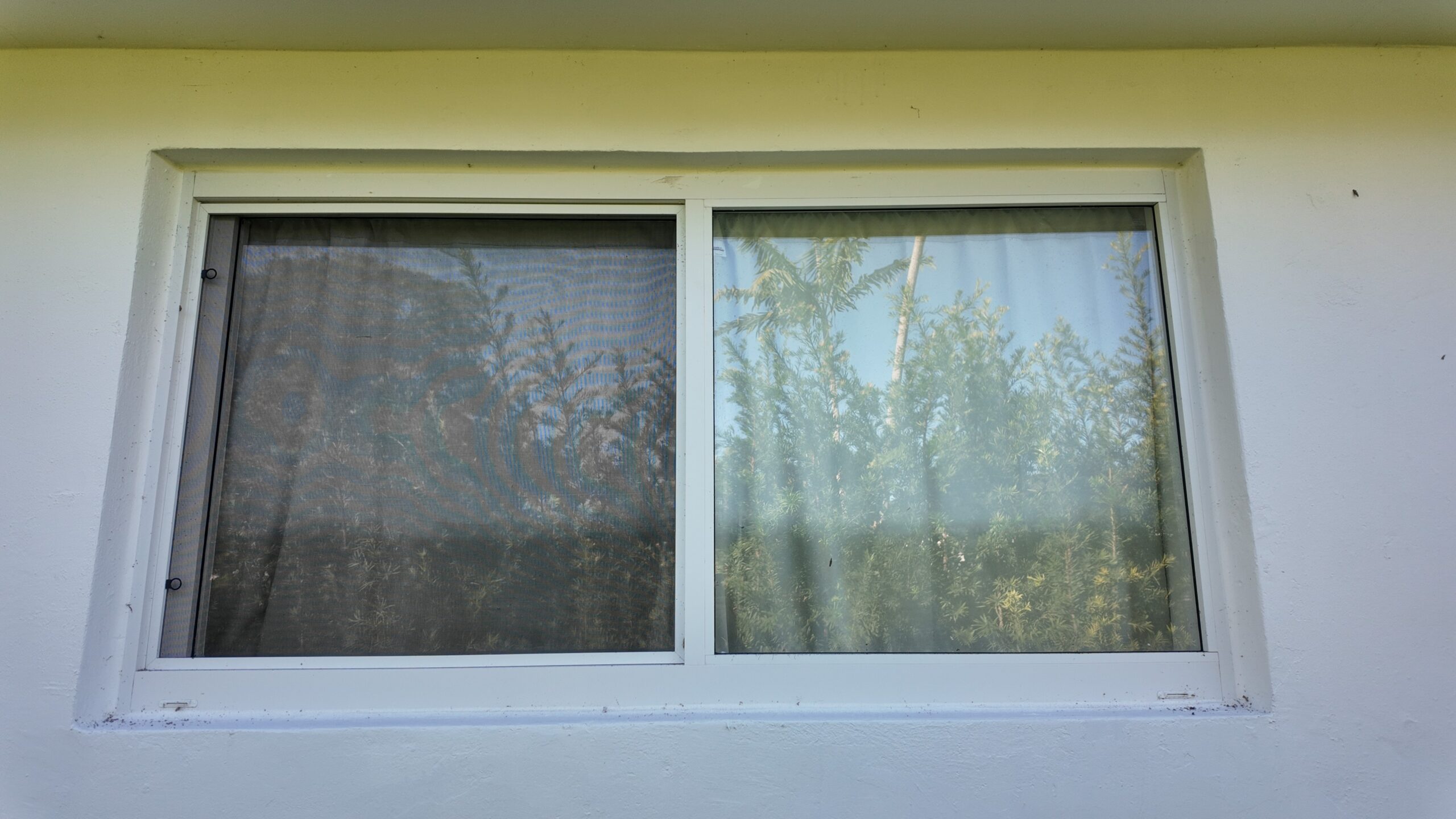 Completed impact window installation in Palmetto Bay by Bigfoot Windows & Roofing