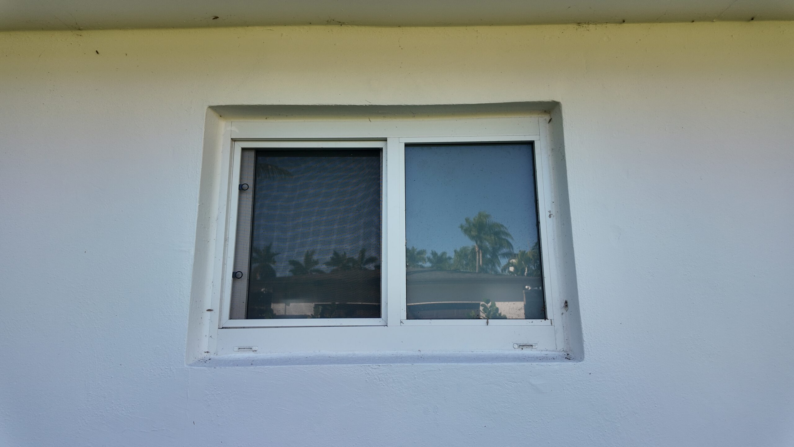 Completed impact window installation in Palmetto Bay by Bigfoot Windows & Roofing