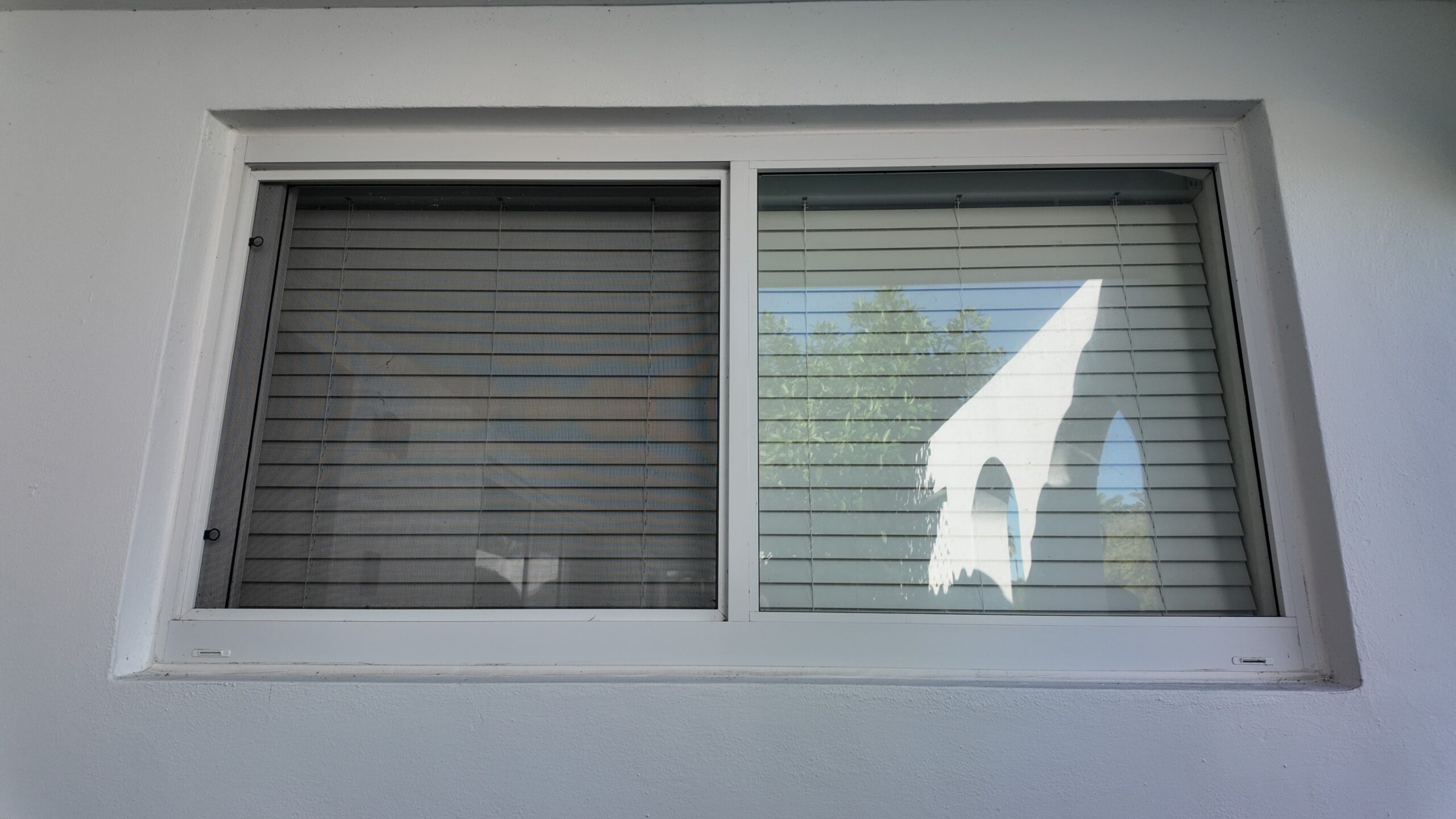 Completed impact window installation in Palmetto Bay by Bigfoot Windows & Roofing — view 2
