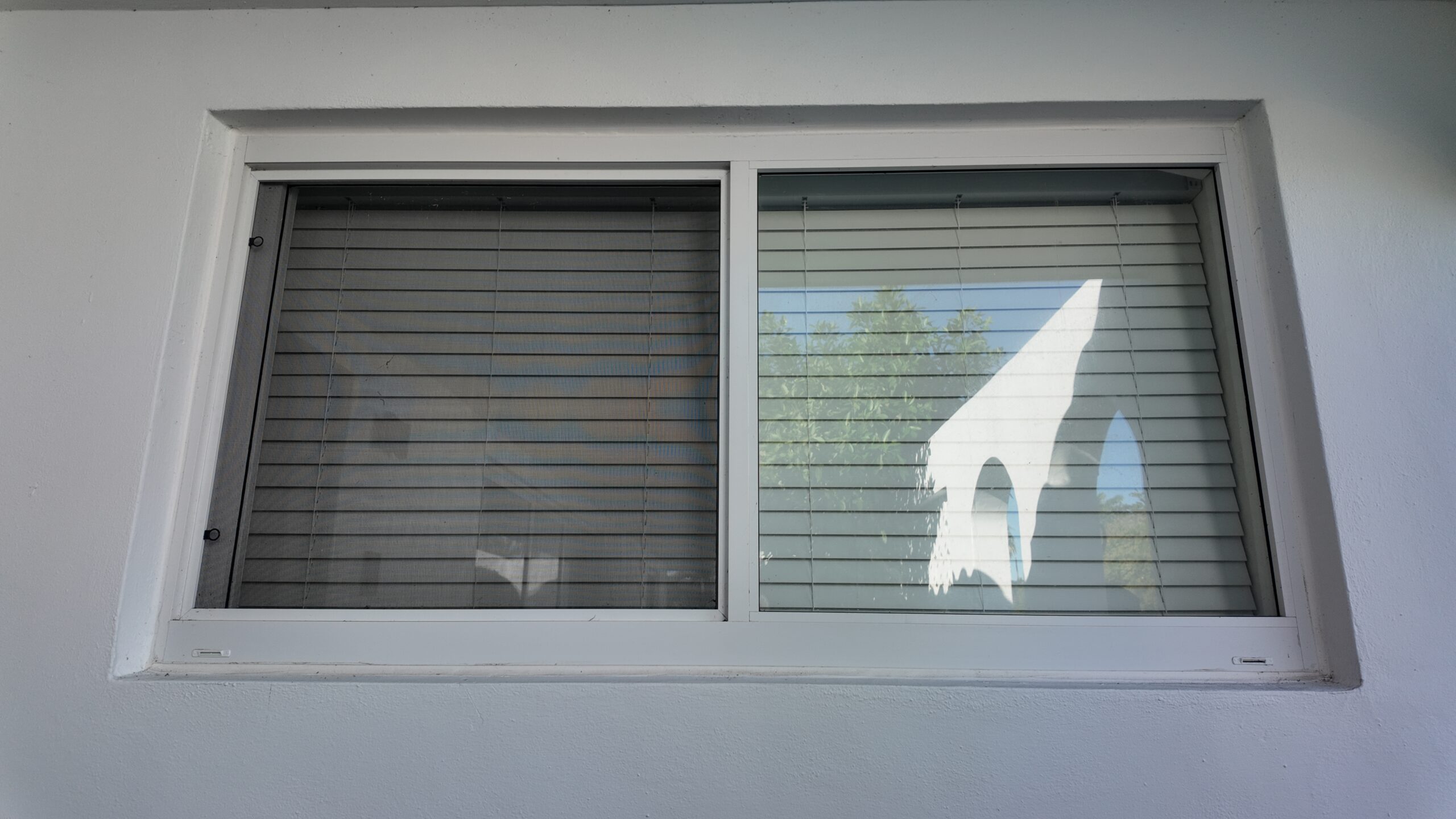 Completed impact window installation in Palmetto Bay by Bigfoot Windows & Roofing