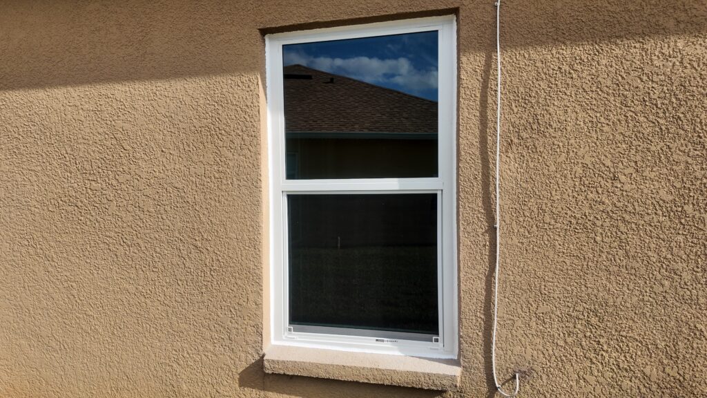 Completed impact window installation in Orlando by Bigfoot Windows & Roofing