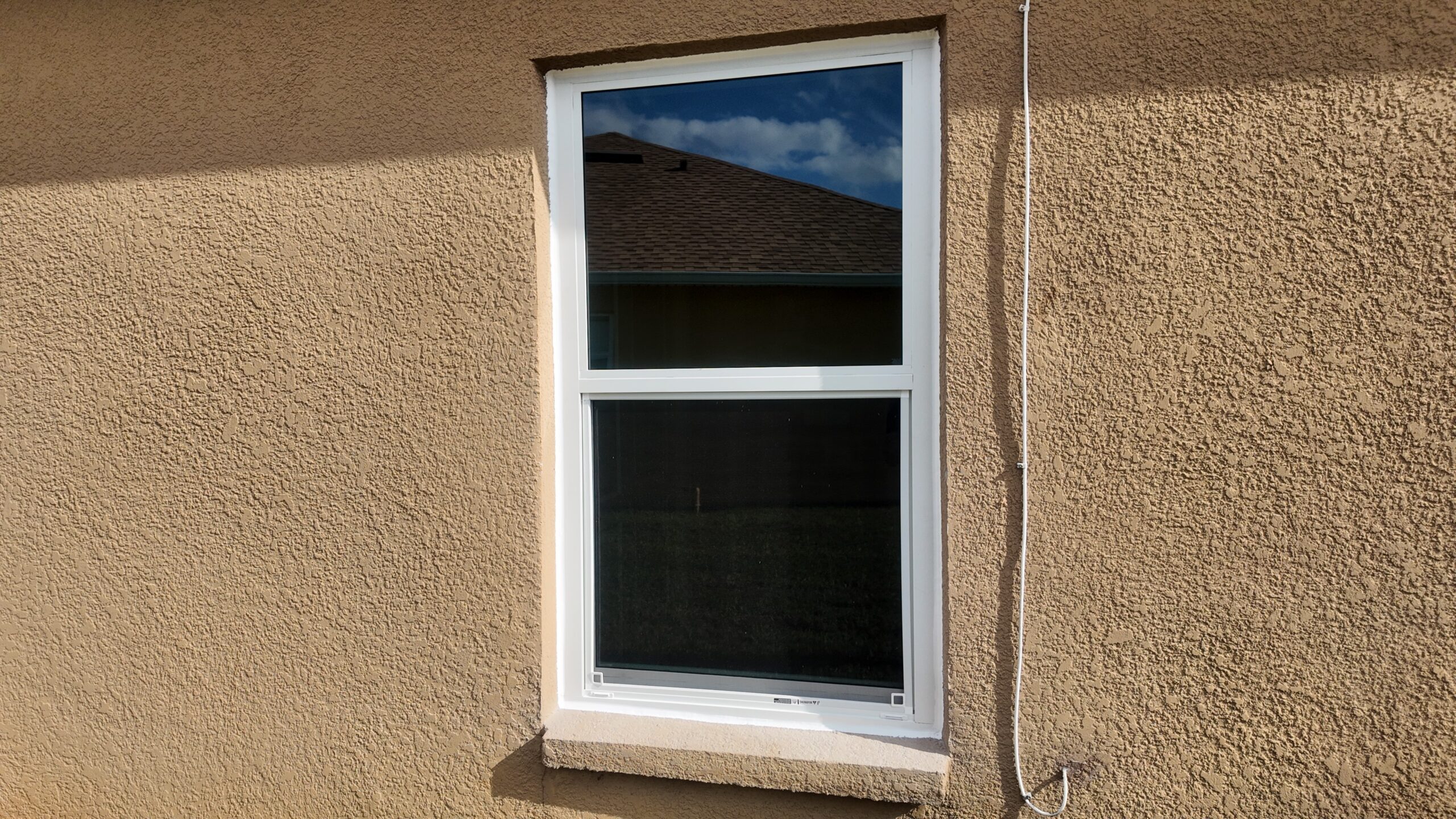 Completed impact window installation in Orlando by Bigfoot Windows & Roofing