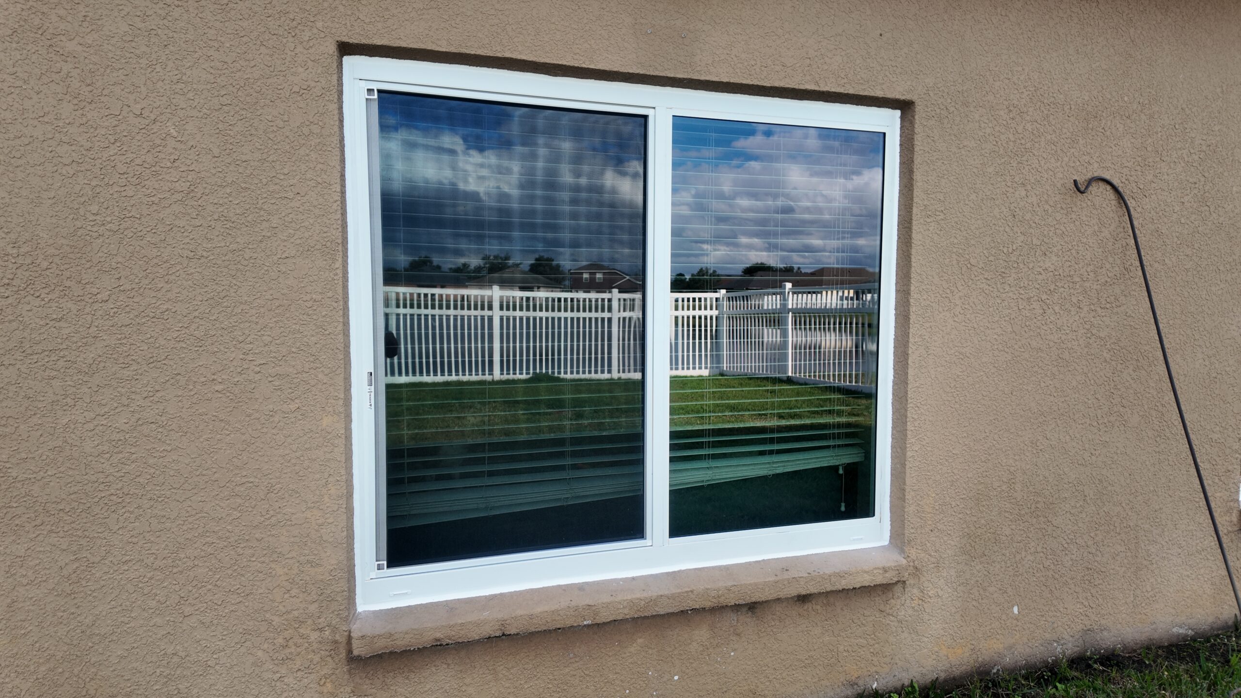 Completed impact window installation in Orlando by Bigfoot Windows & Roofing