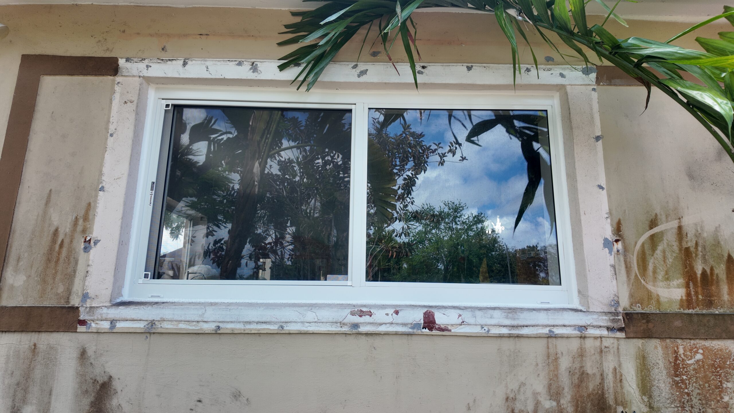Completed impact window installation in Cutler Bay by Bigfoot Windows & Roofing