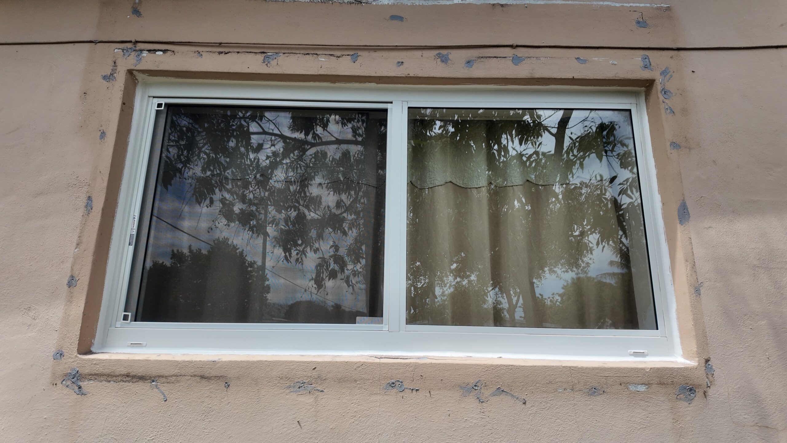 Completed impact window installation in Cutler Bay by Bigfoot Windows & Roofing — view 2