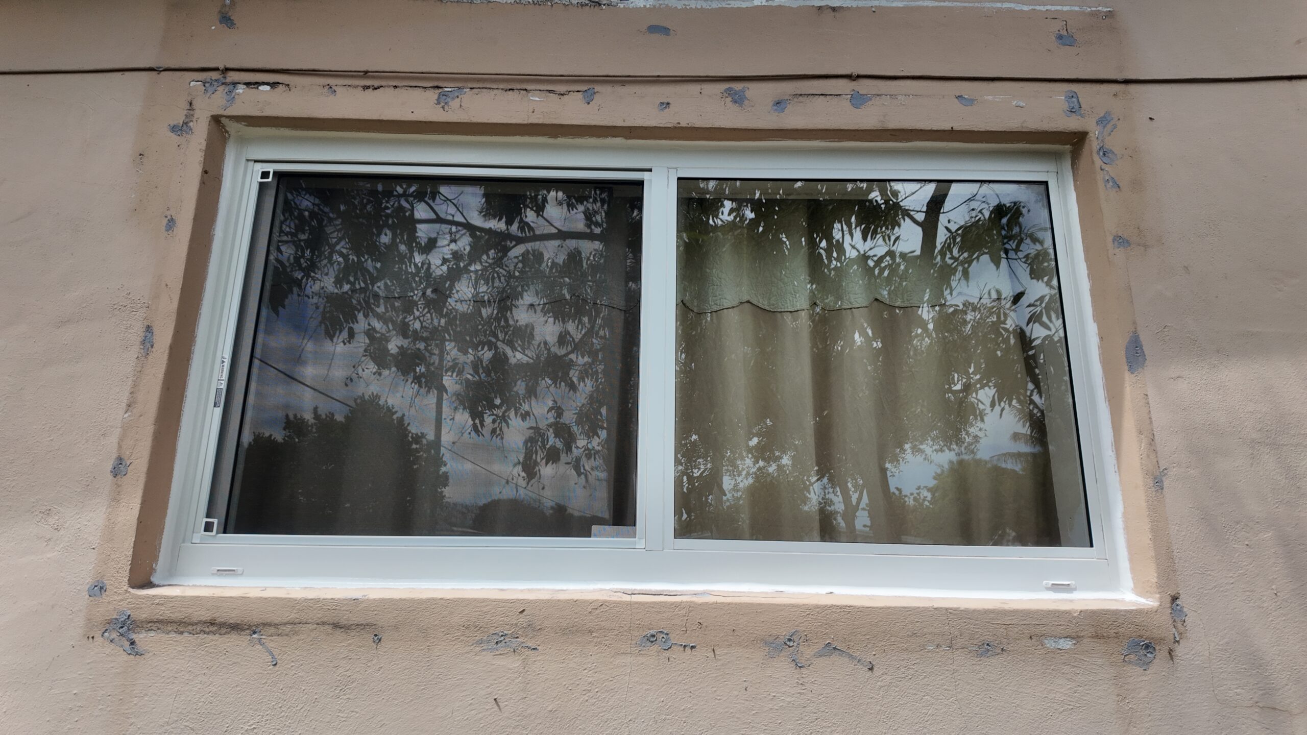 Completed impact window installation in Cutler Bay by Bigfoot Windows & Roofing