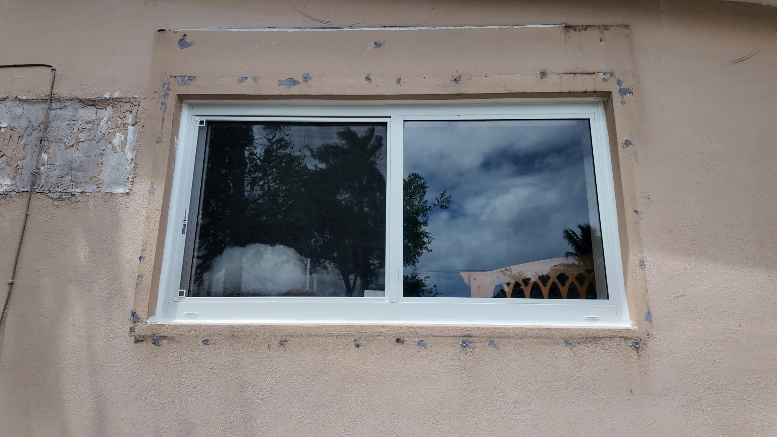 Completed impact window installation in Cutler Bay by Bigfoot Windows & Roofing