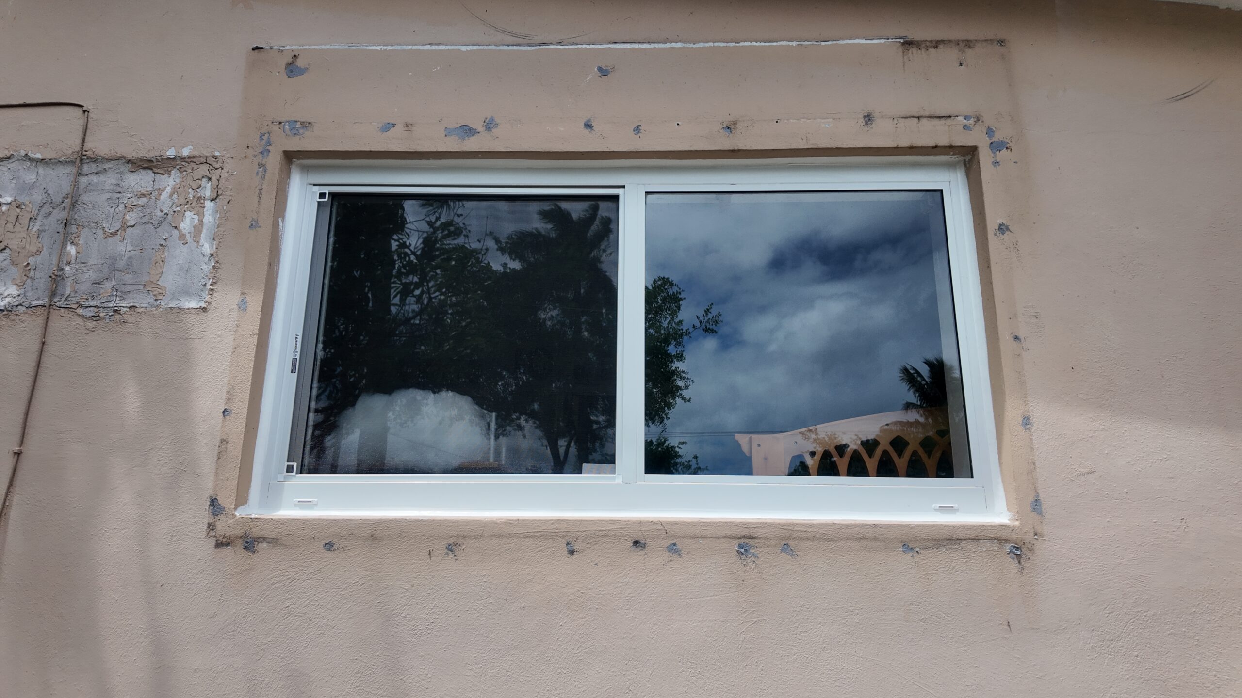Completed impact window installation in Cutler Bay by Bigfoot Windows & Roofing