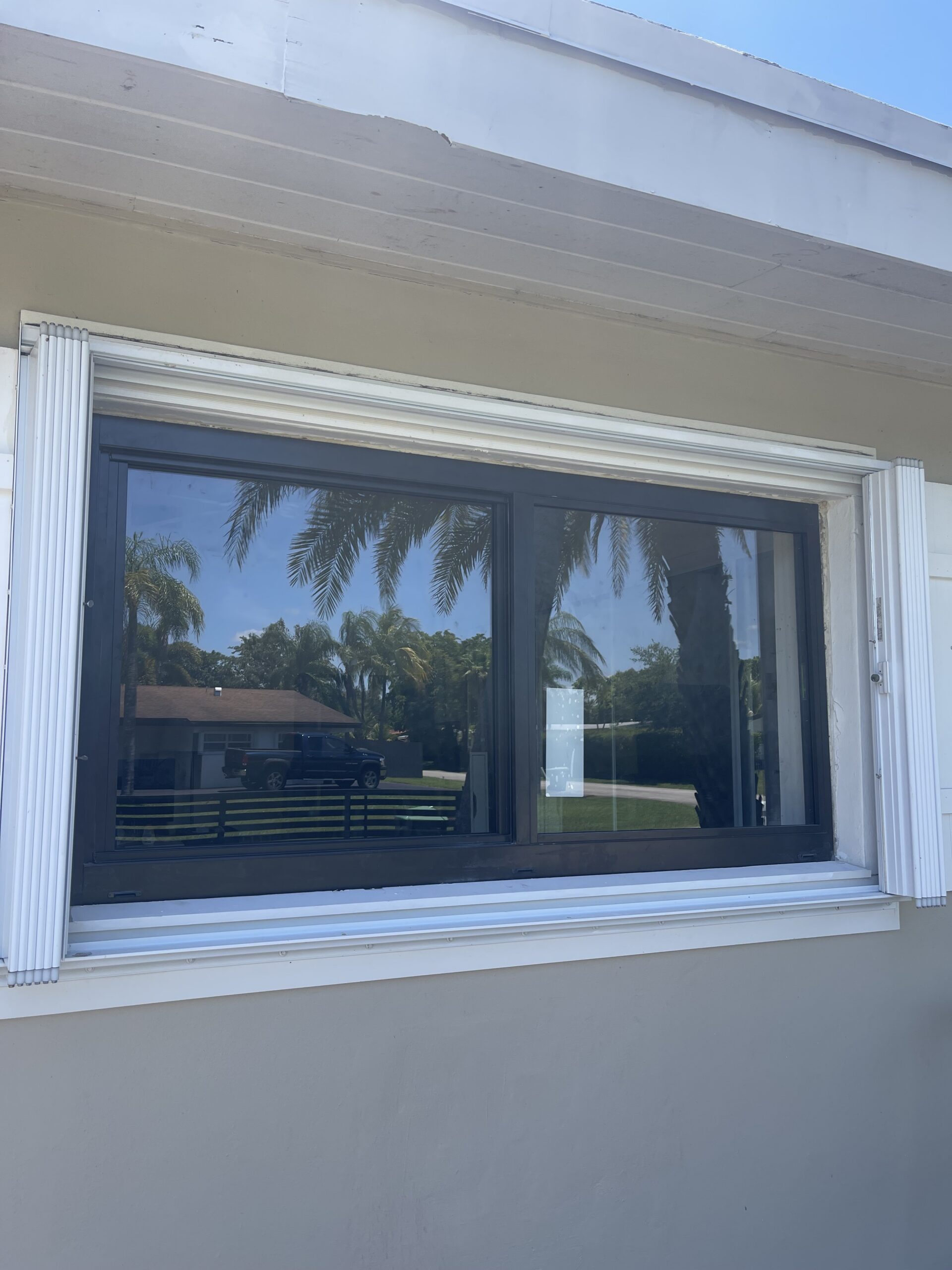 Completed impact window installation in Miami by Bigfoot Windows & Roofing — unknown