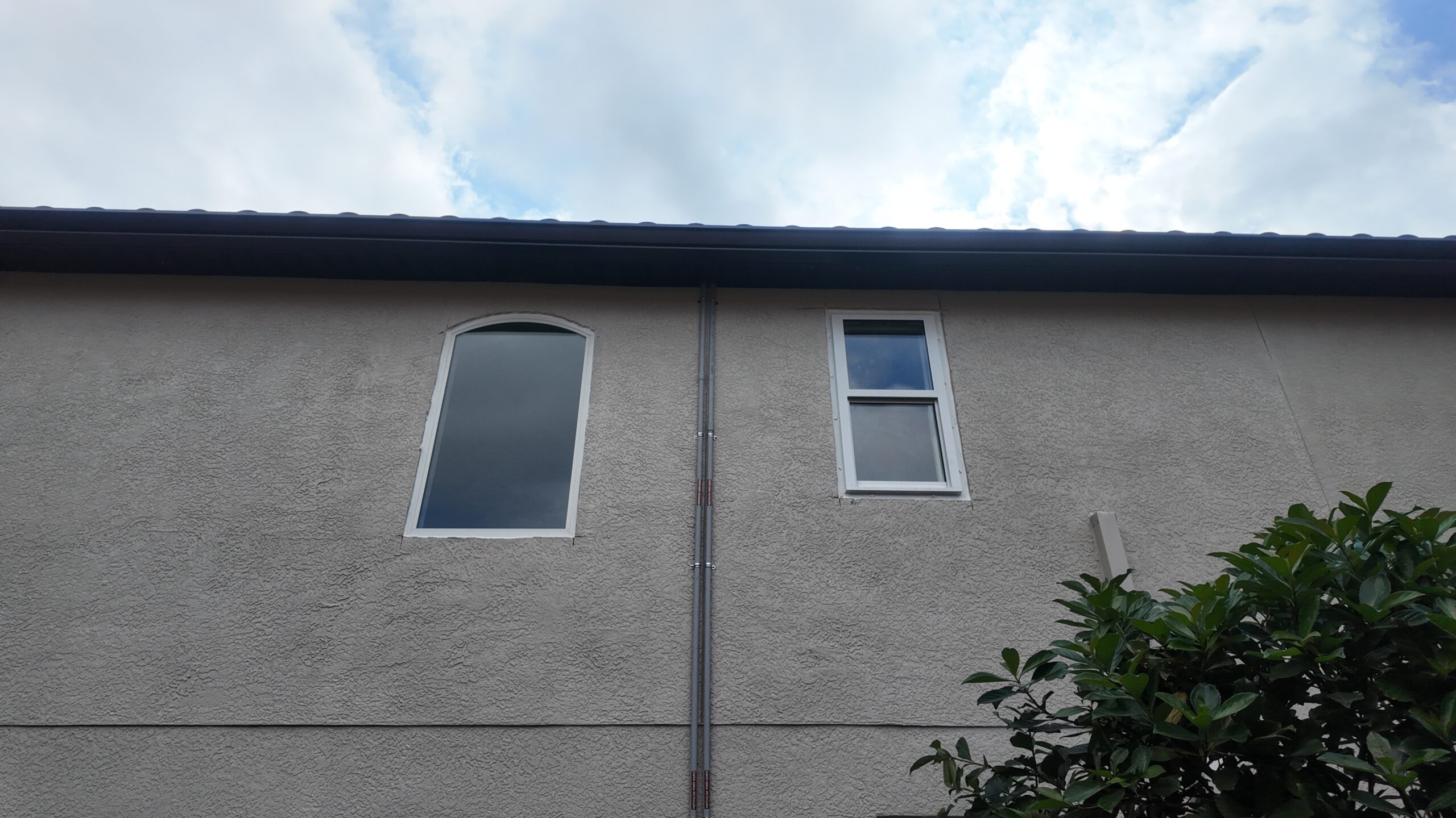 Completed impact window project in Tampa by Bigfoot Windows & Roofing