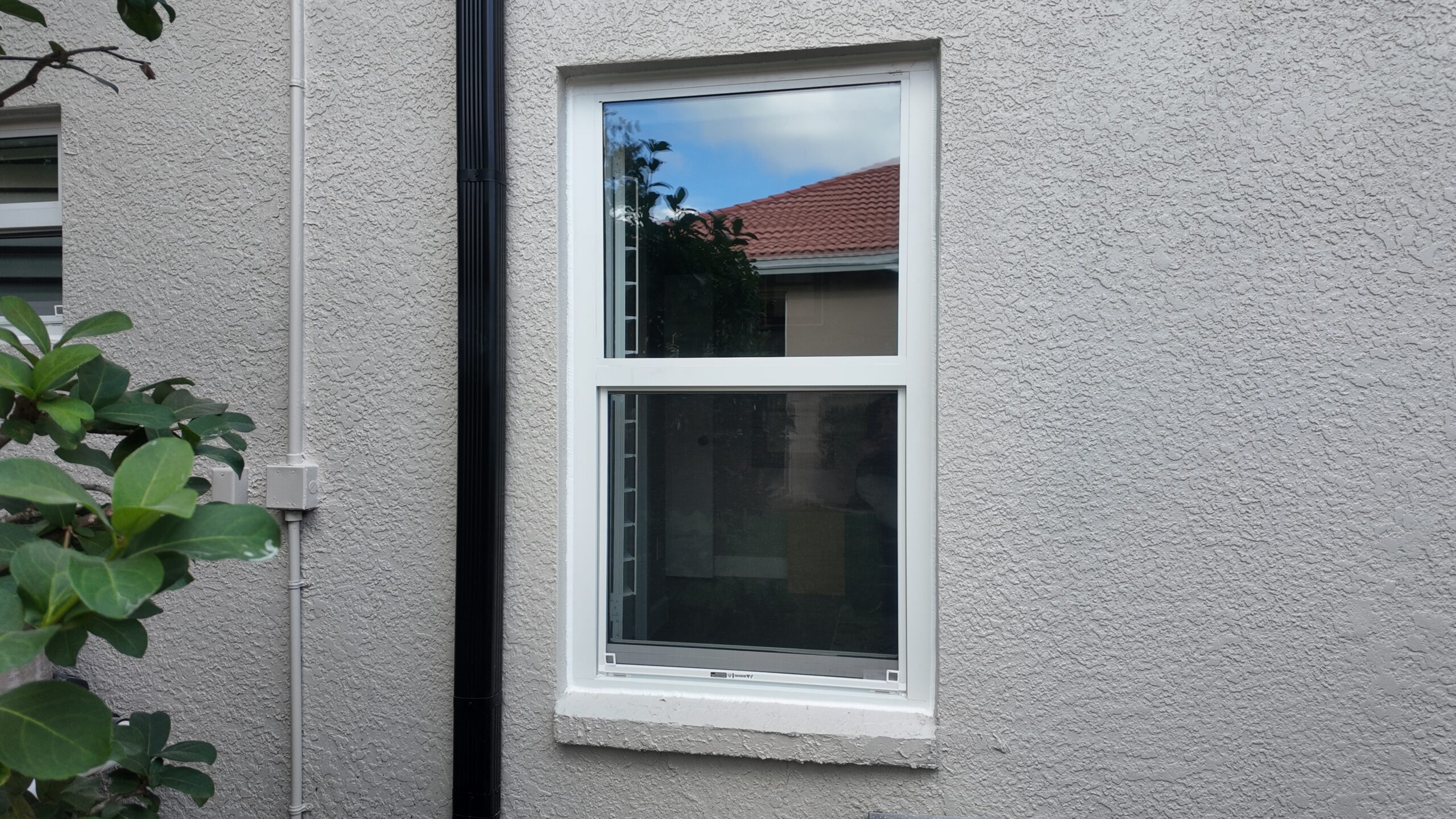 Completed impact window project in Tampa by Bigfoot Windows & Roofing