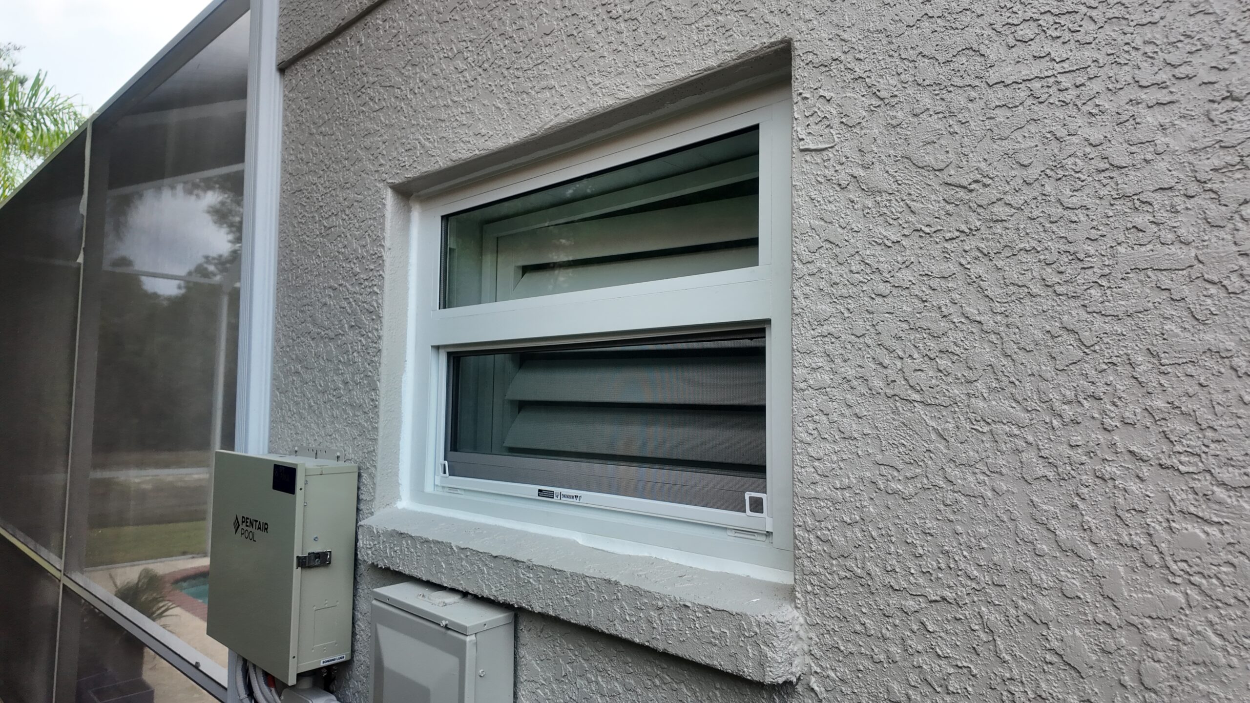 Completed impact window project in Tampa by Bigfoot Windows & Roofing
