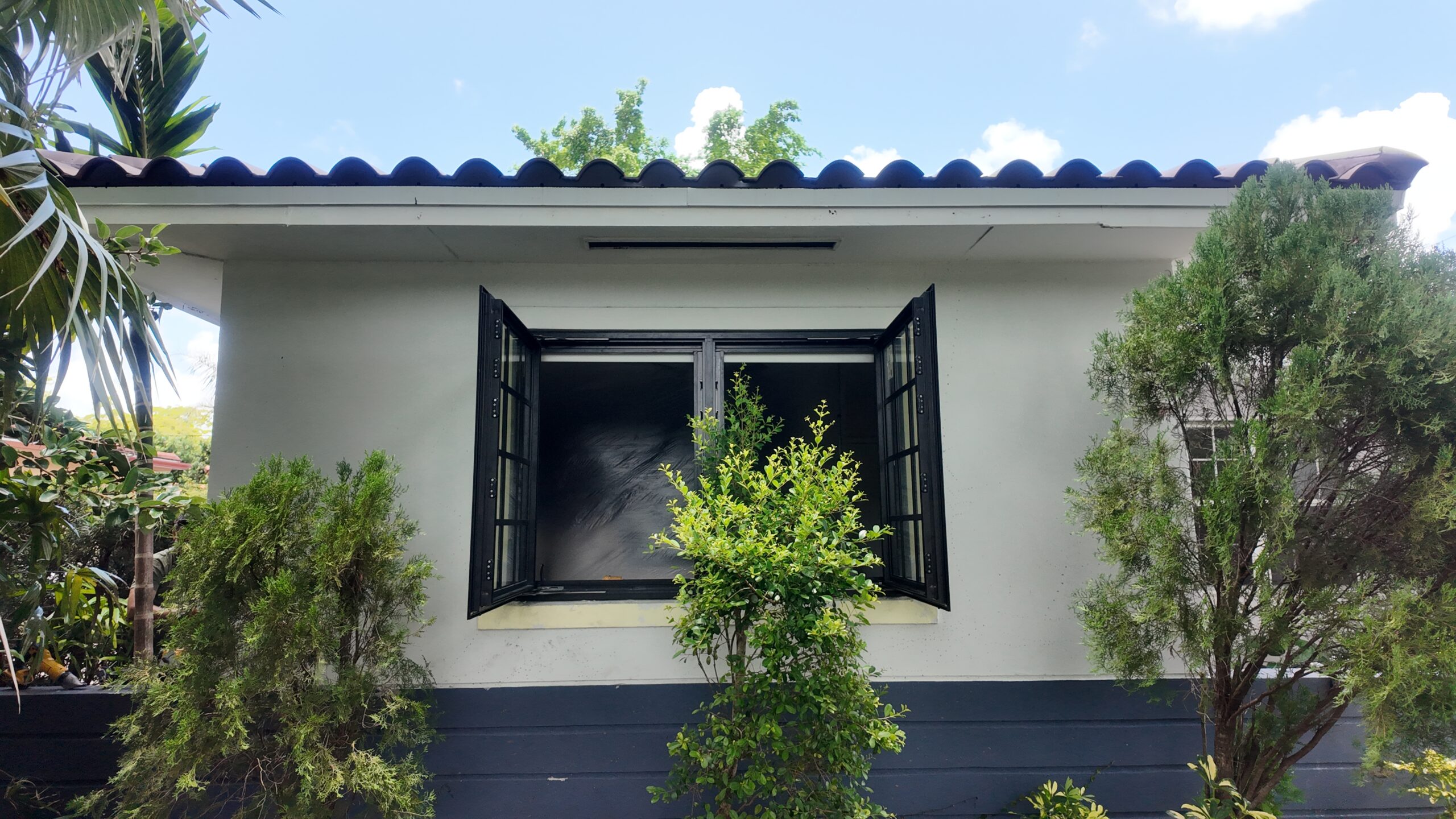 Dark-framed Mr. Glass window at a Coral Gables home