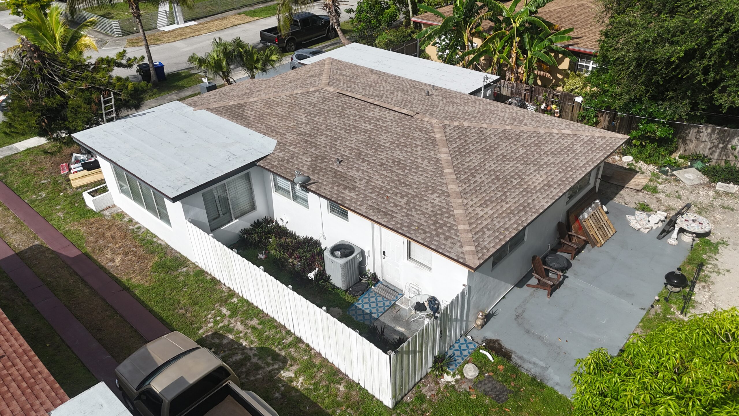 Completed shingle roof project in Miami, Florida