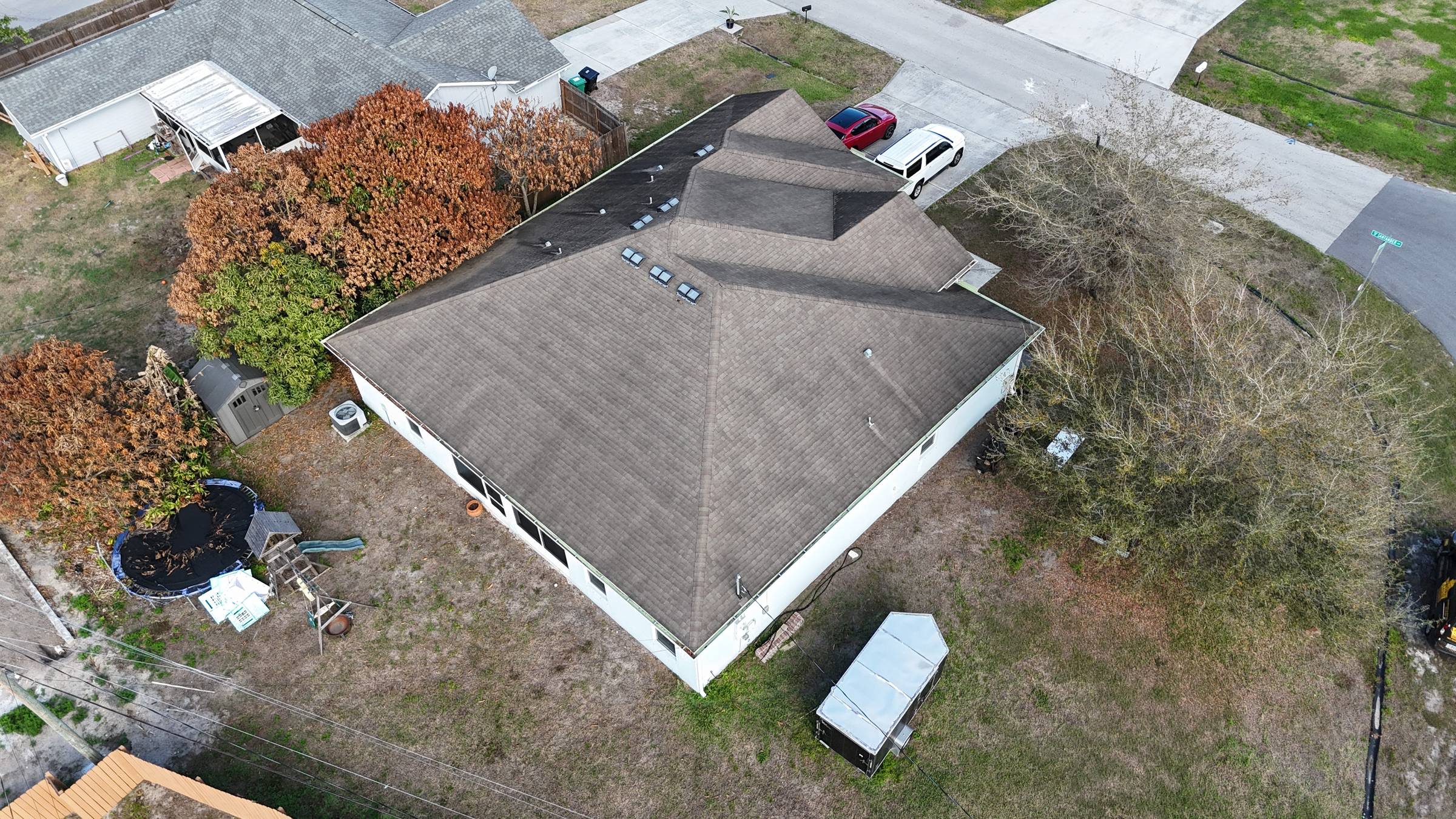 Aerial view of completed roof in Port St. Lucie by Bigfoot Windows & Roofing — view 2