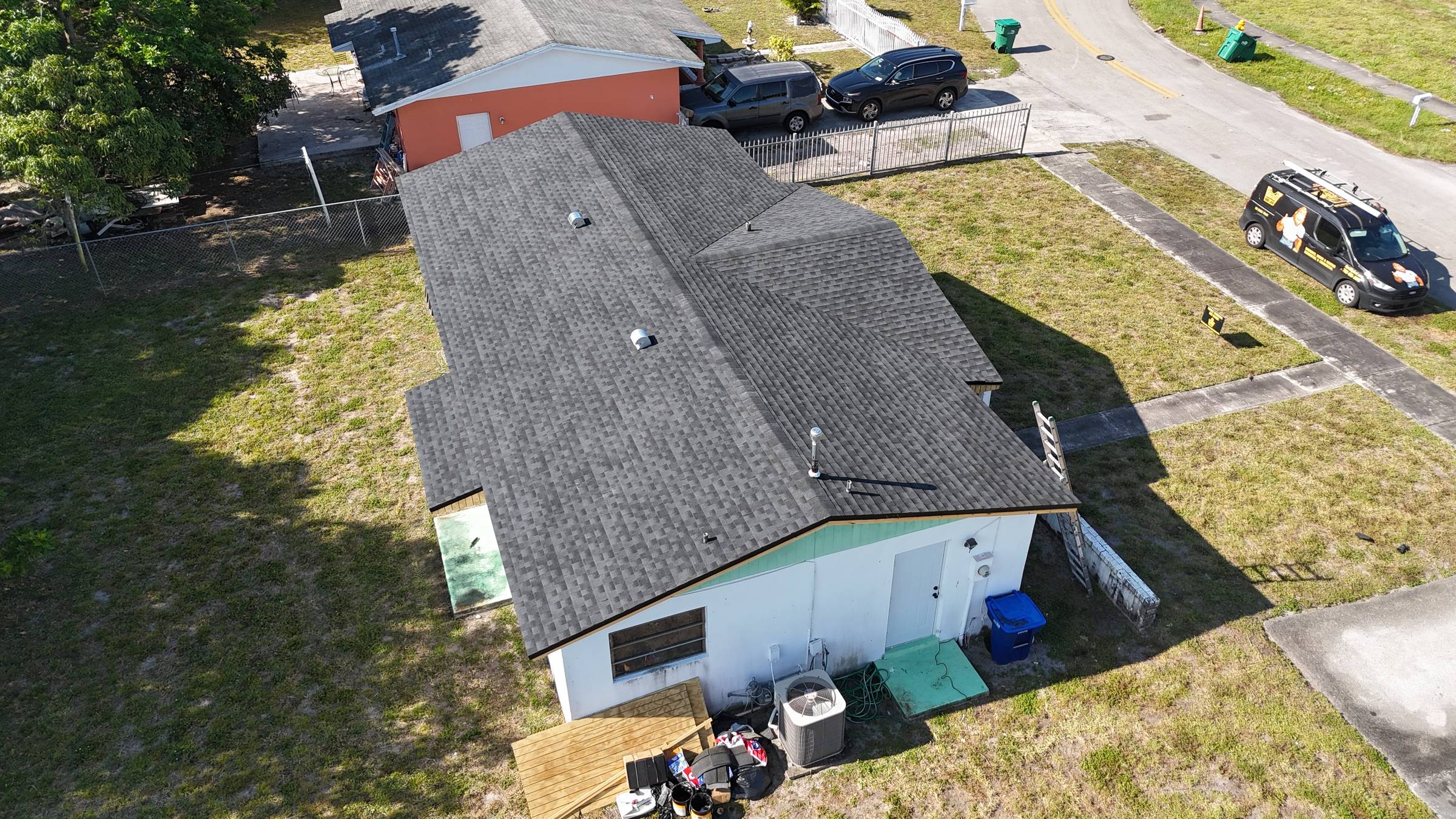 Completed shingle roof in Miami Gardens by Bigfoot Windows & Roofing