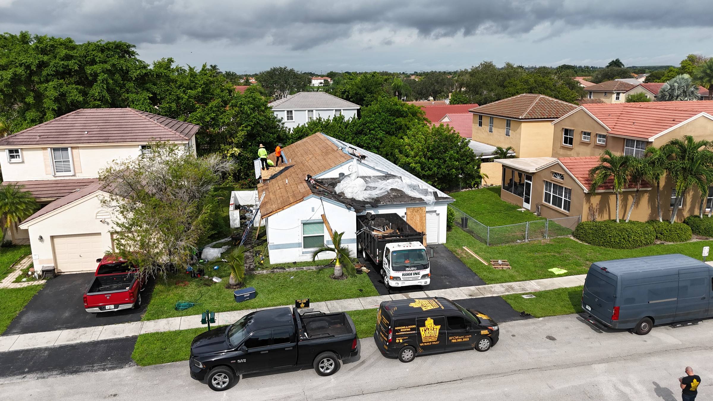 Storm-damaged roof in Pembroke Pines by Bigfoot Windows & Roofing — view 2
