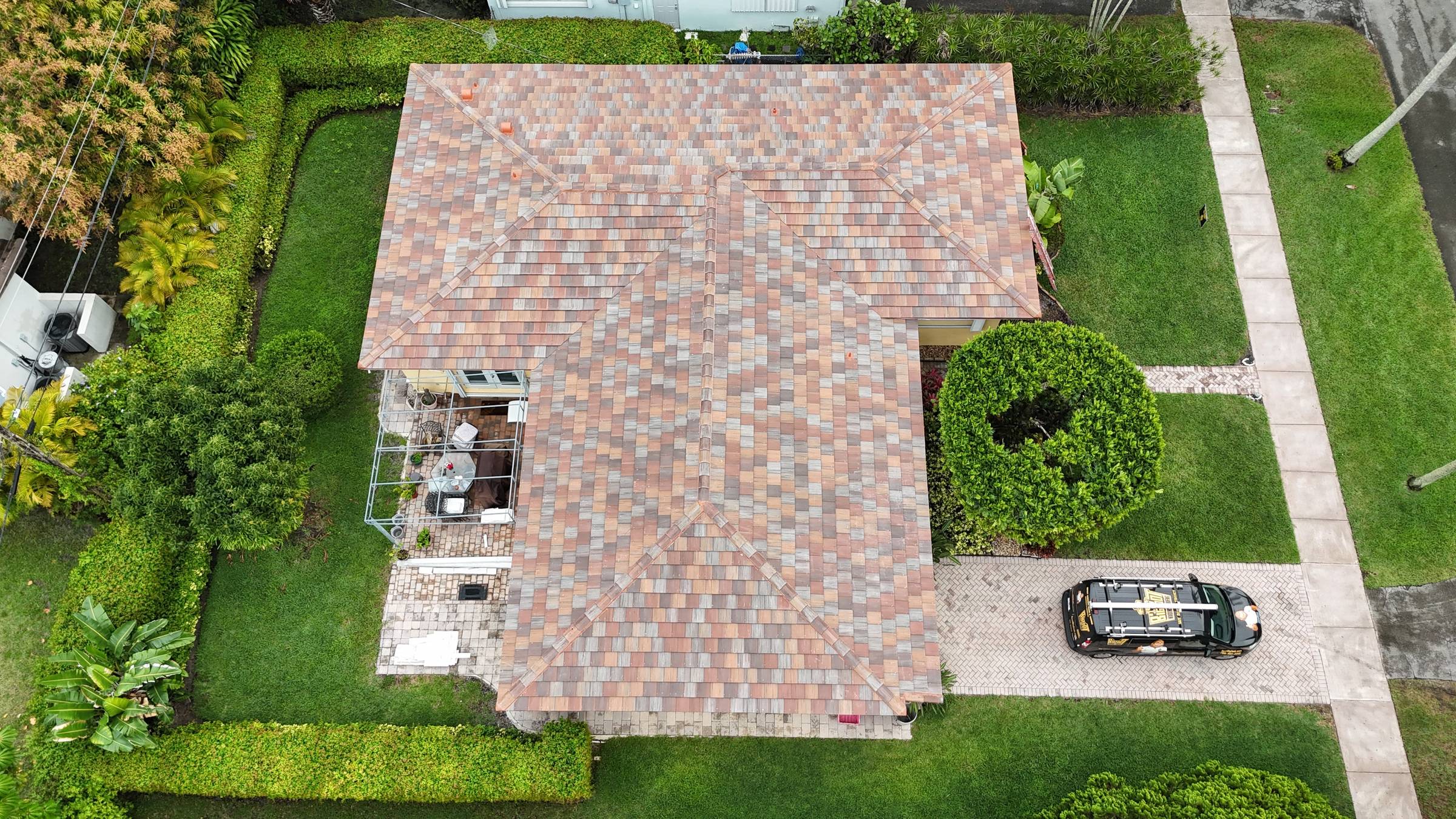 Completed tile roof in Coral Gables by Bigfoot Windows & Roofing — after