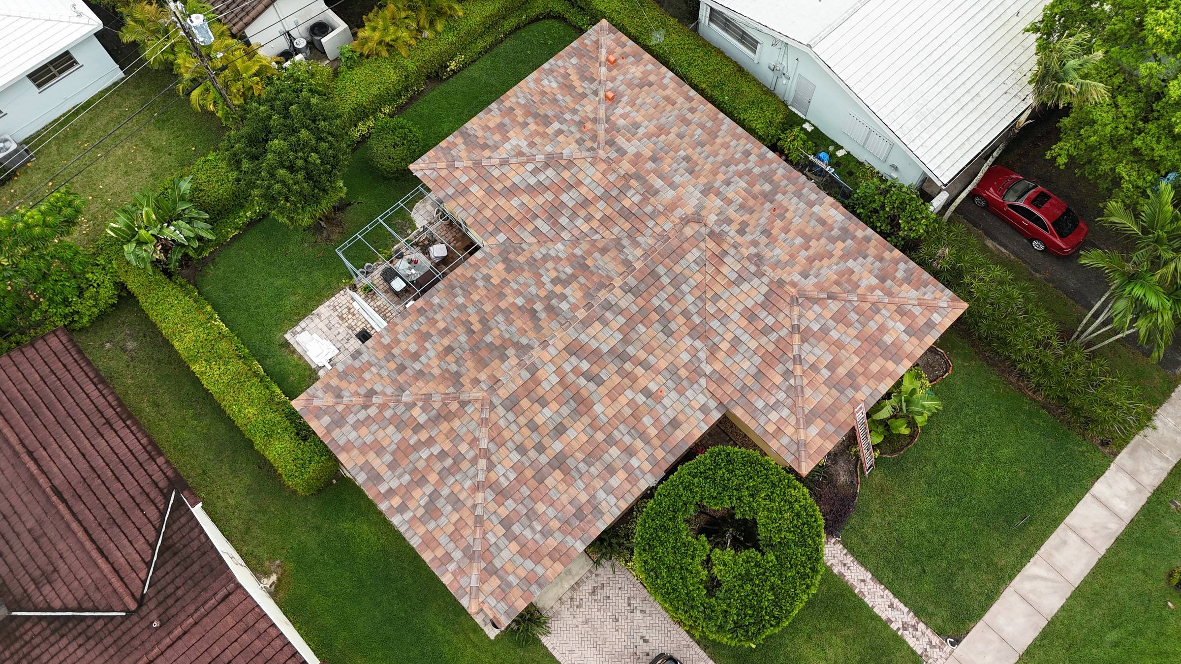 Completed tile roof in Coral Gables by Bigfoot Windows & Roofing — view 2