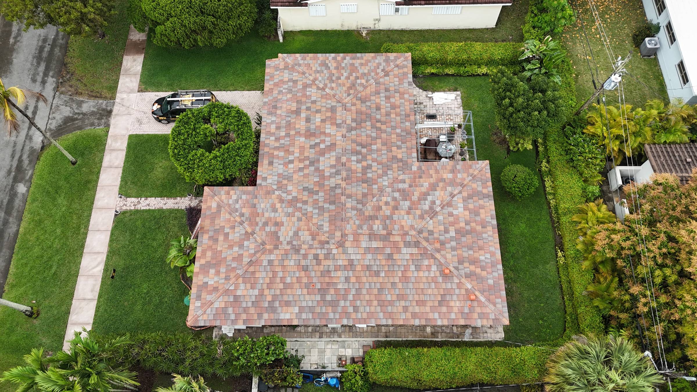 Completed tile roof in Coral Gables by Bigfoot Windows & Roofing — after