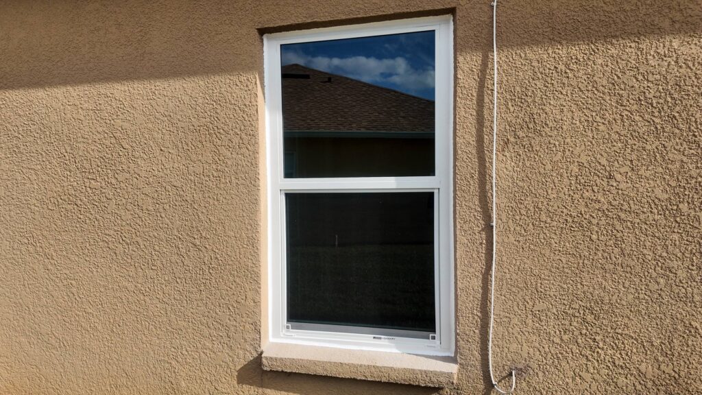 Completed impact window installation in Orlando by Bigfoot Windows & Roofing