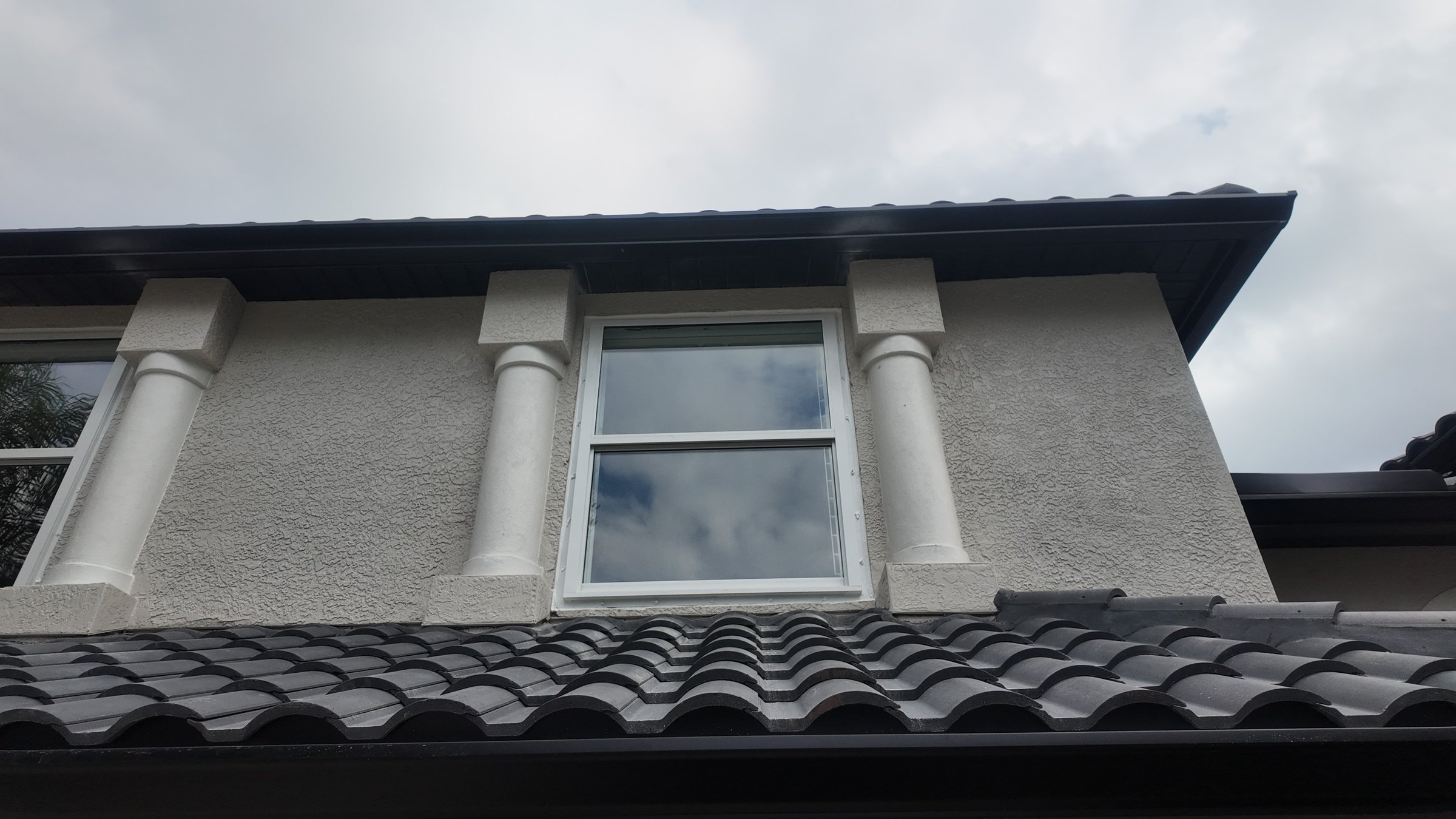Completed impact window installation in Tampa by Bigfoot Windows & Roofing