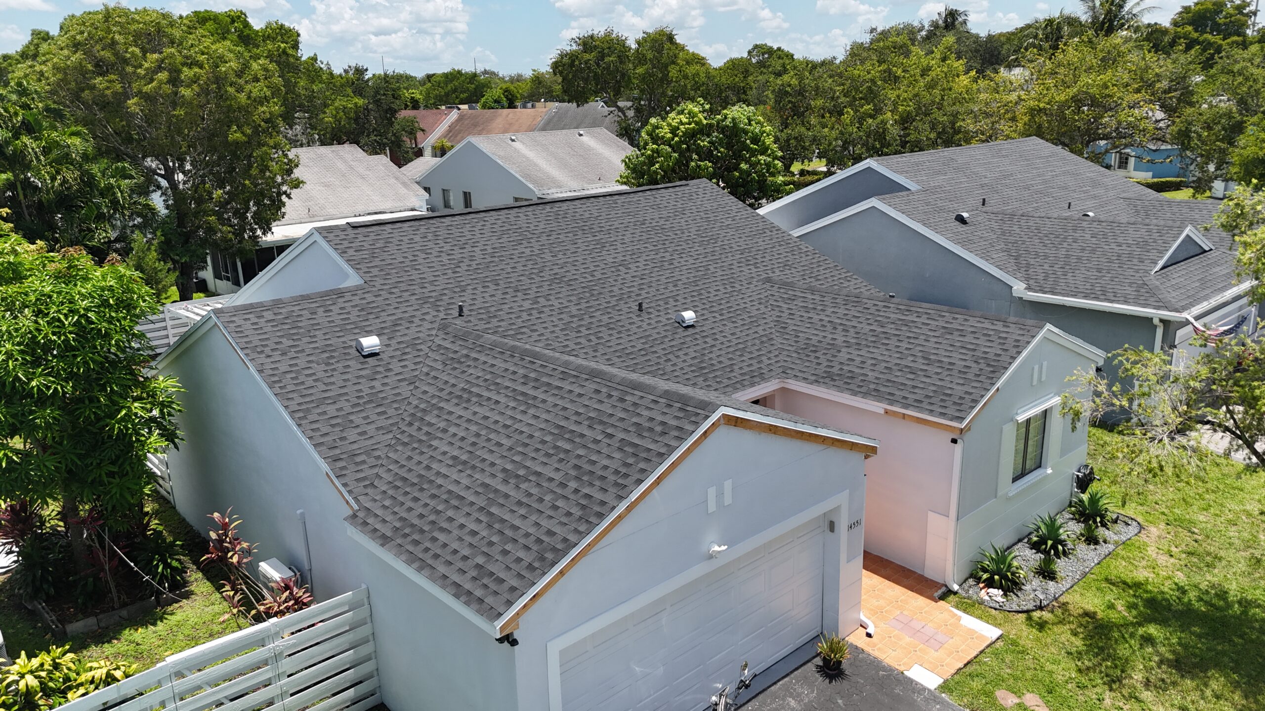 After drone view of Gabriela’s shingle roof project in Country Walk
